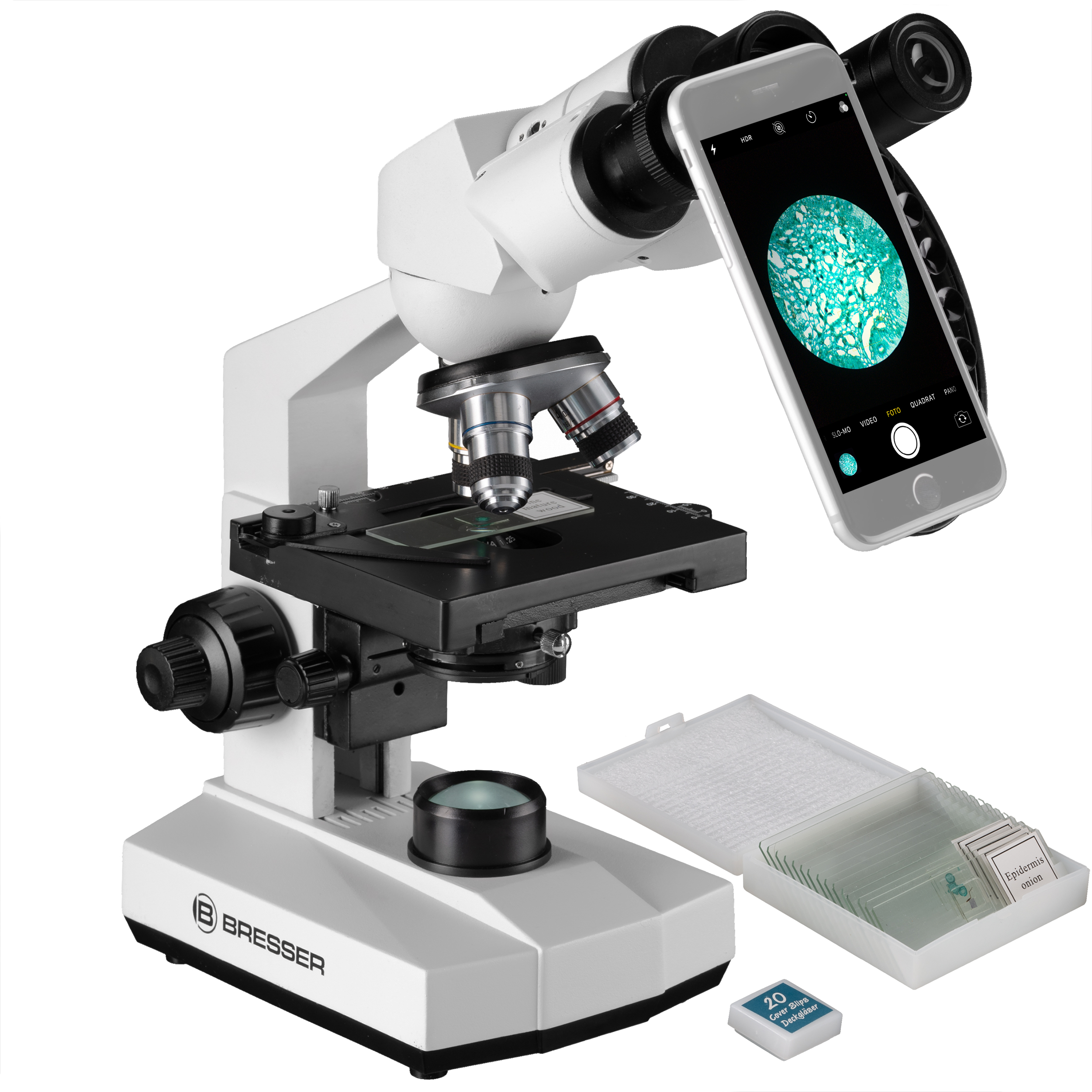 Un microscopio con un teléfono adjunto, mostrando una muestra de célula. Portaobjetos y una caja en primer plano.