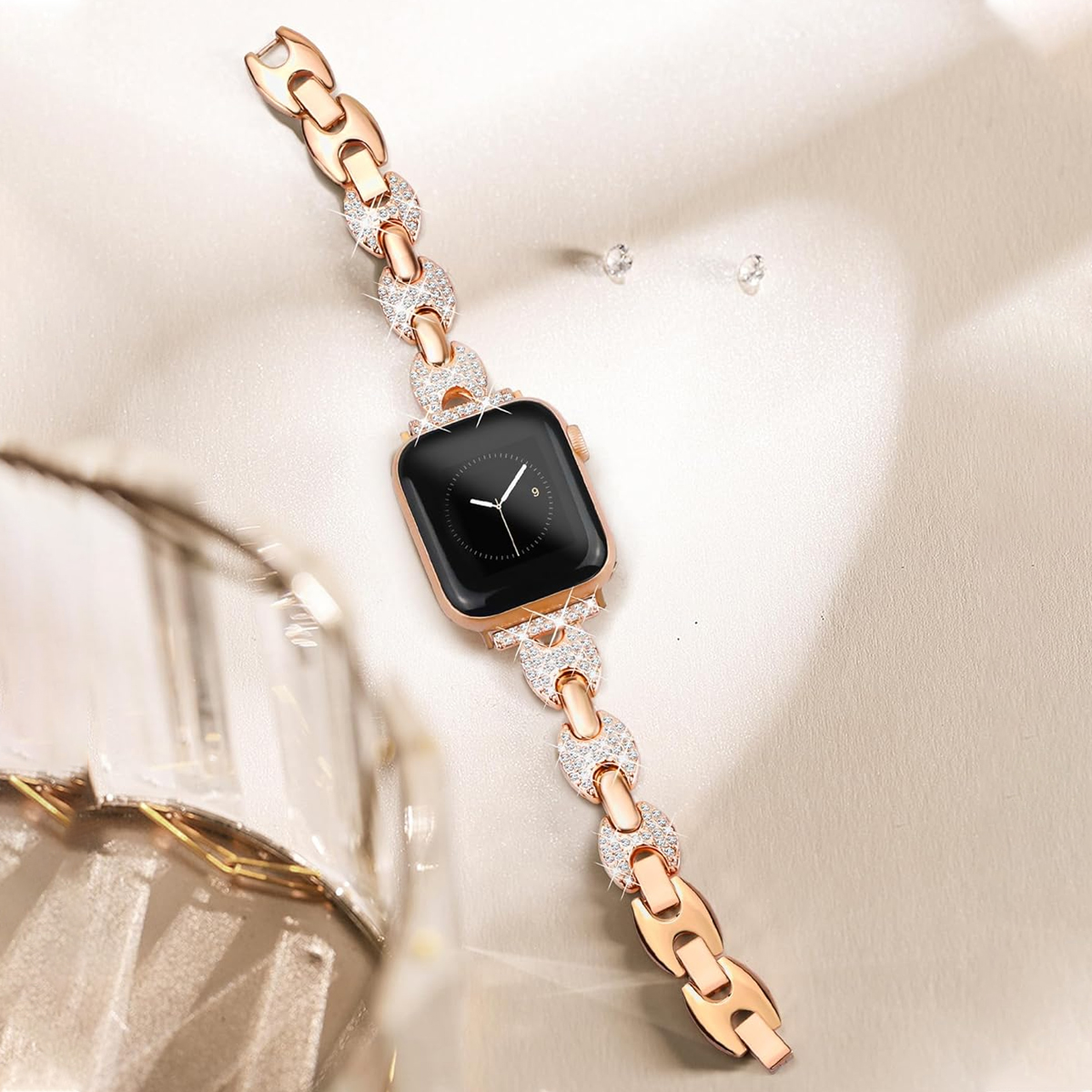 Roségold-Smartwatch mit einem diamantartigen Armband.