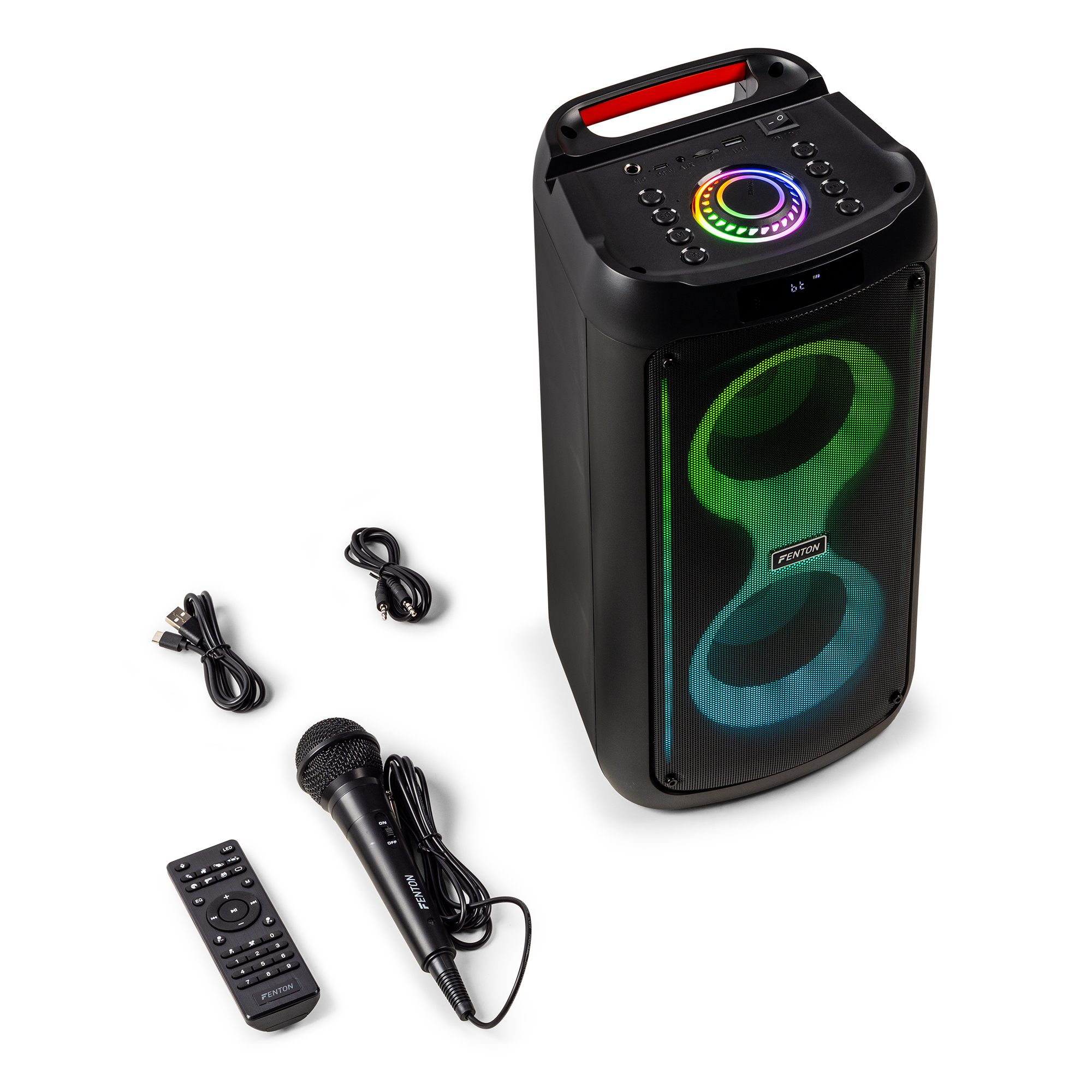 Altavoz negro con luces, micrófono, mando y cables sobre superficie blanca.
