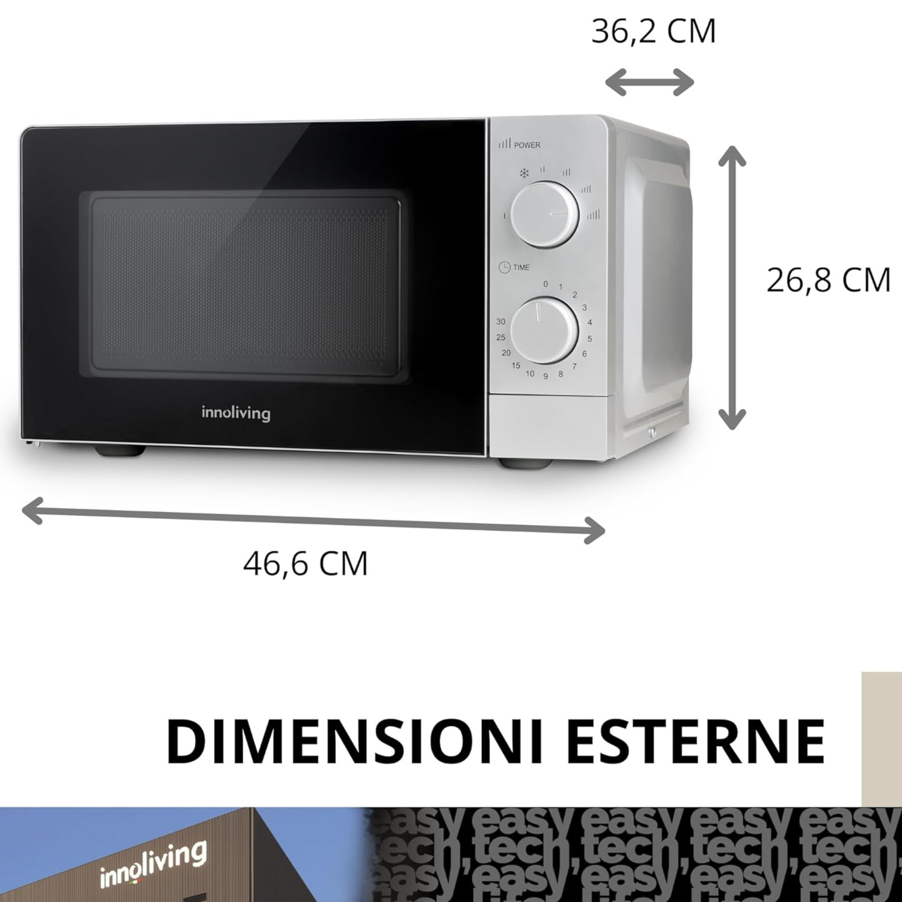 Horno microondas con dimensiones mostradas. Es plateado y negro.