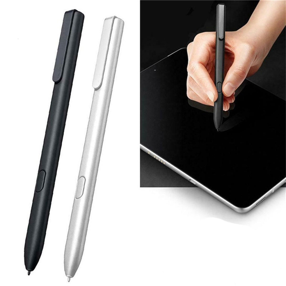 Zwei Stifte, schwarz und silber, neben einem Tablet, mit einer Hand, die einen hält.