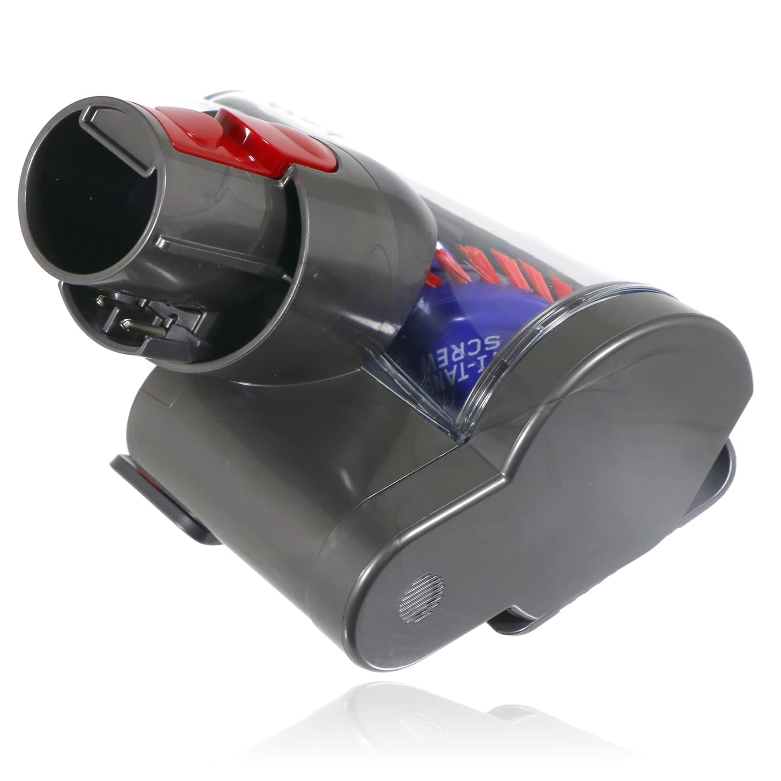 Zbliżenie głowicy odkurzacza. Szary korpus z czerwonymi przyciskami i przezroczysty fragment pokazujący szczotki w środku.