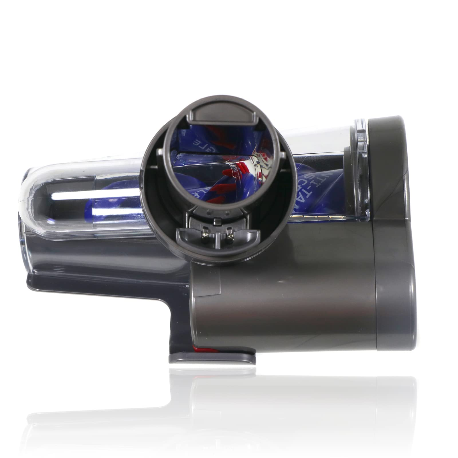 Szare plastikowe urządzenie z przezroczystym pojemnikiem wypełnionym niebieskimi i czerwonymi przedmiotami.