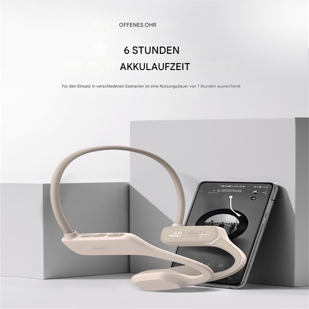 Kopfhörer um Telefon gewickelt. Text sagt 6 Stunden Akkulaufzeit. Cremefarbe.
