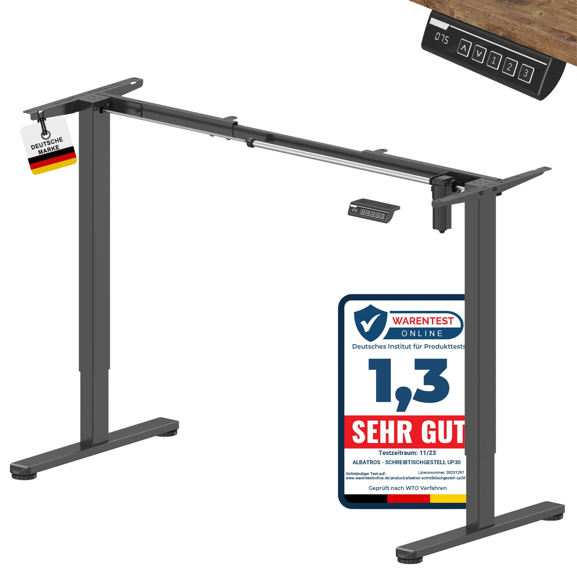 Ein schwarz-graues Stehpultgestell mit Monitor und Etikett.