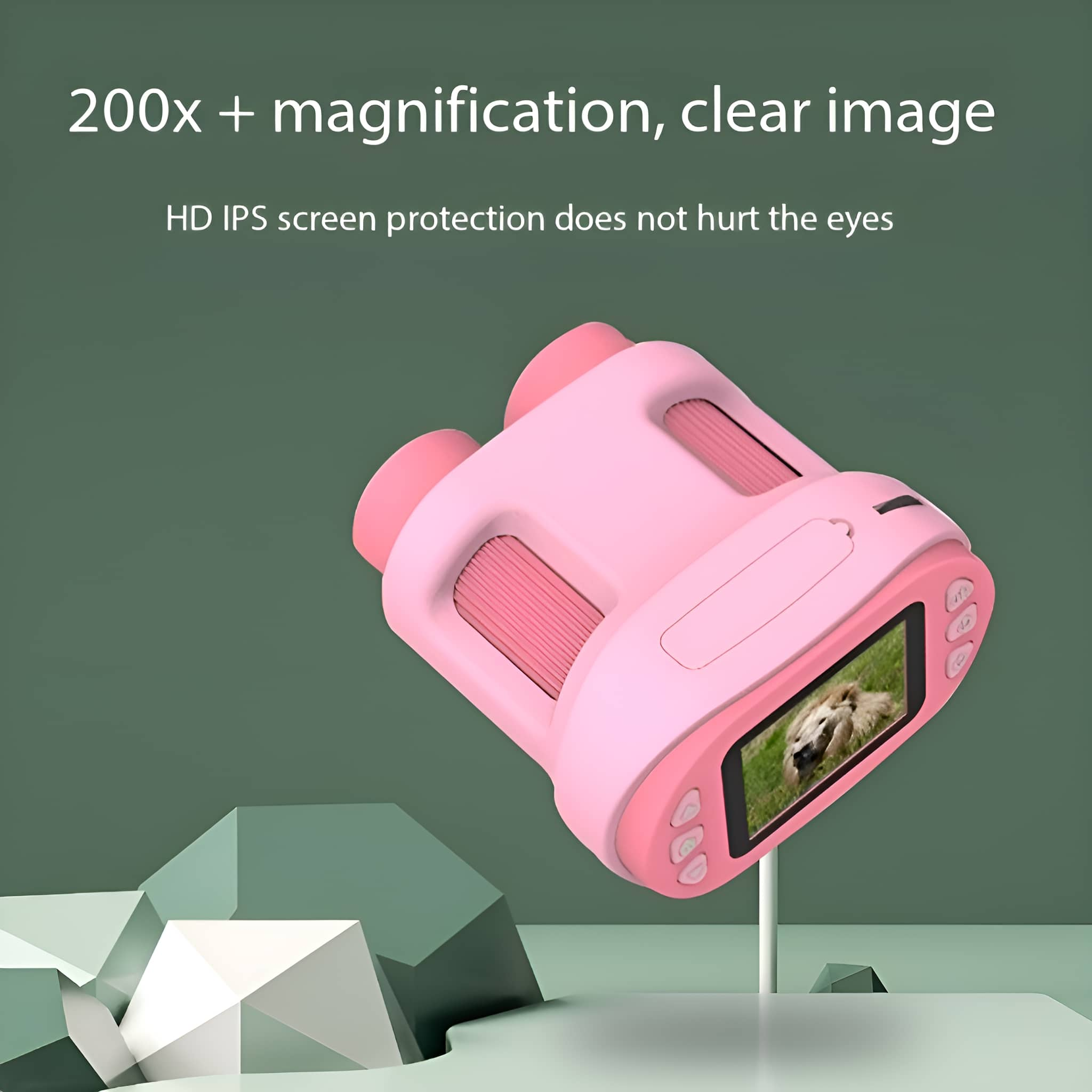 Rosa Digitalkamera mit Bildschirm, der einen Hund zeigt, auf grünem Hintergrund.