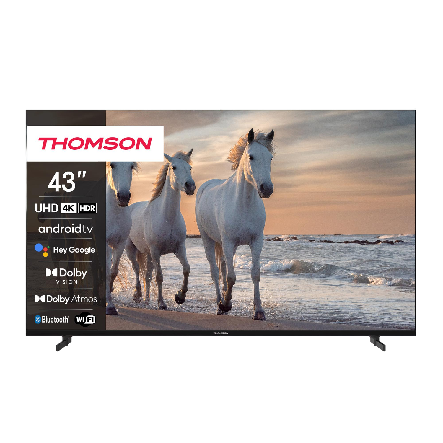 Telewizor Thomson 43" wyświetlający konie na plaży o zachodzie słońca, z funkcjami Android TV.