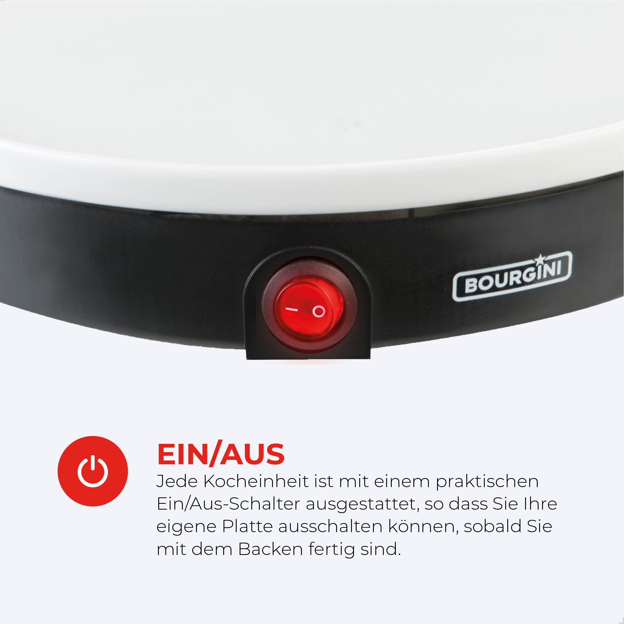 Close-up of a black and white electric griddle with a red power button on.