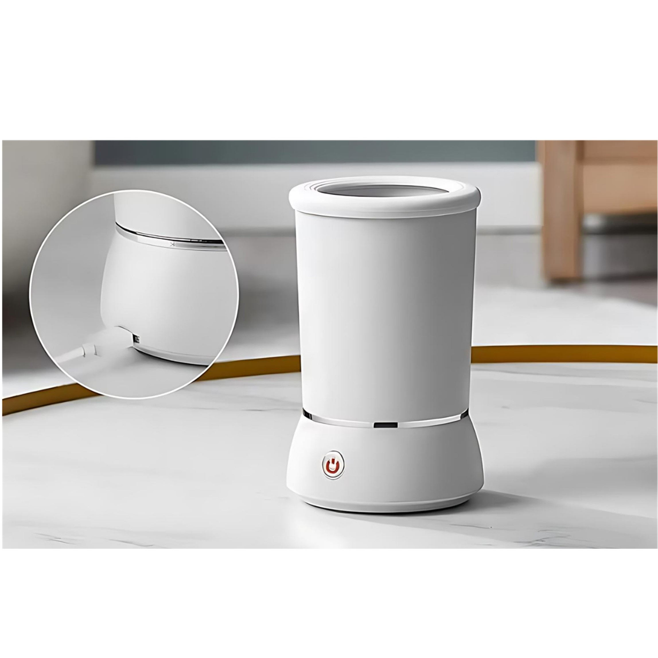 Cuocuova cilindrico bianco con pulsante di accensione rosso e porta USB.