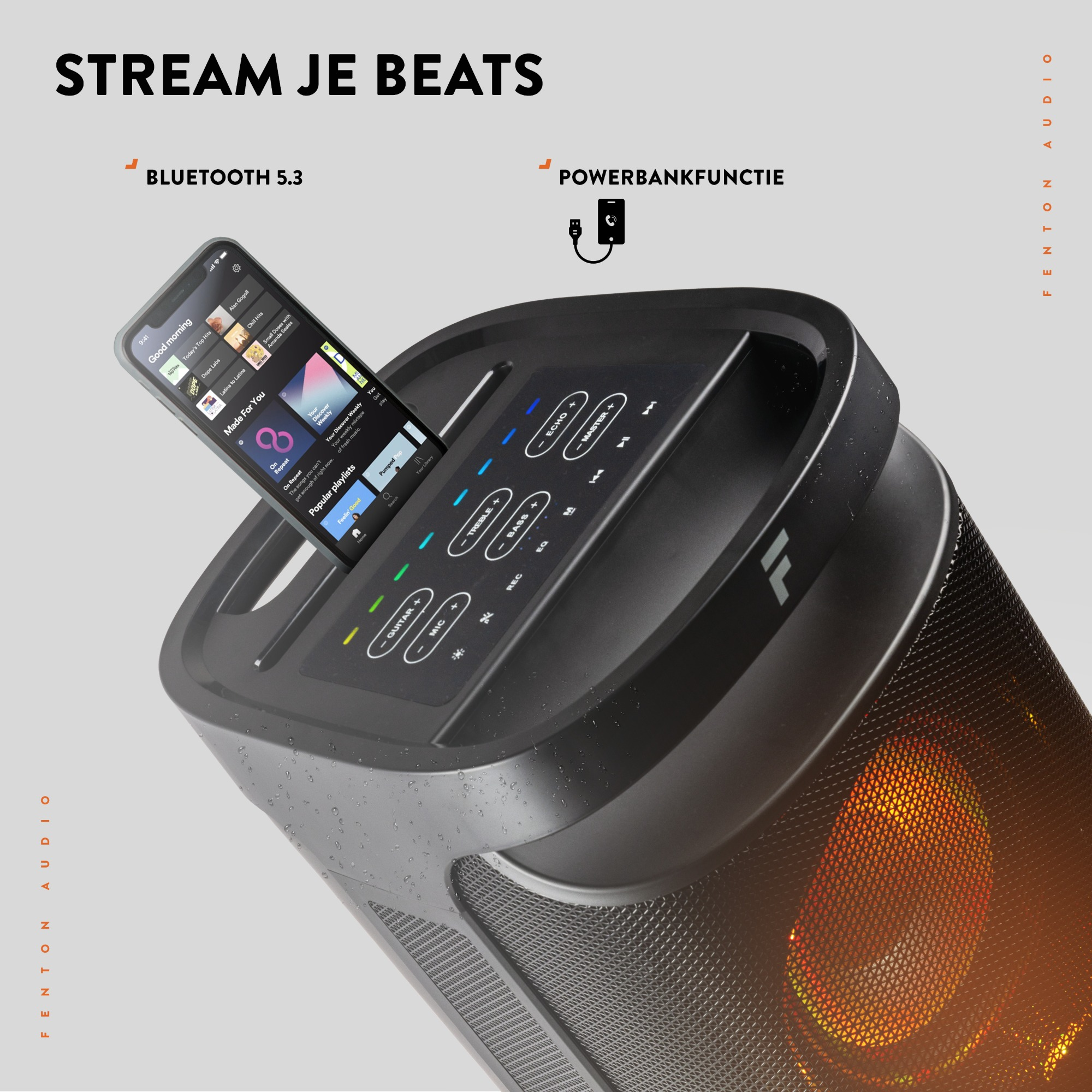Altavoz negro con teléfono mostrando app de música en la parte superior. Controles y texto en el altavoz.