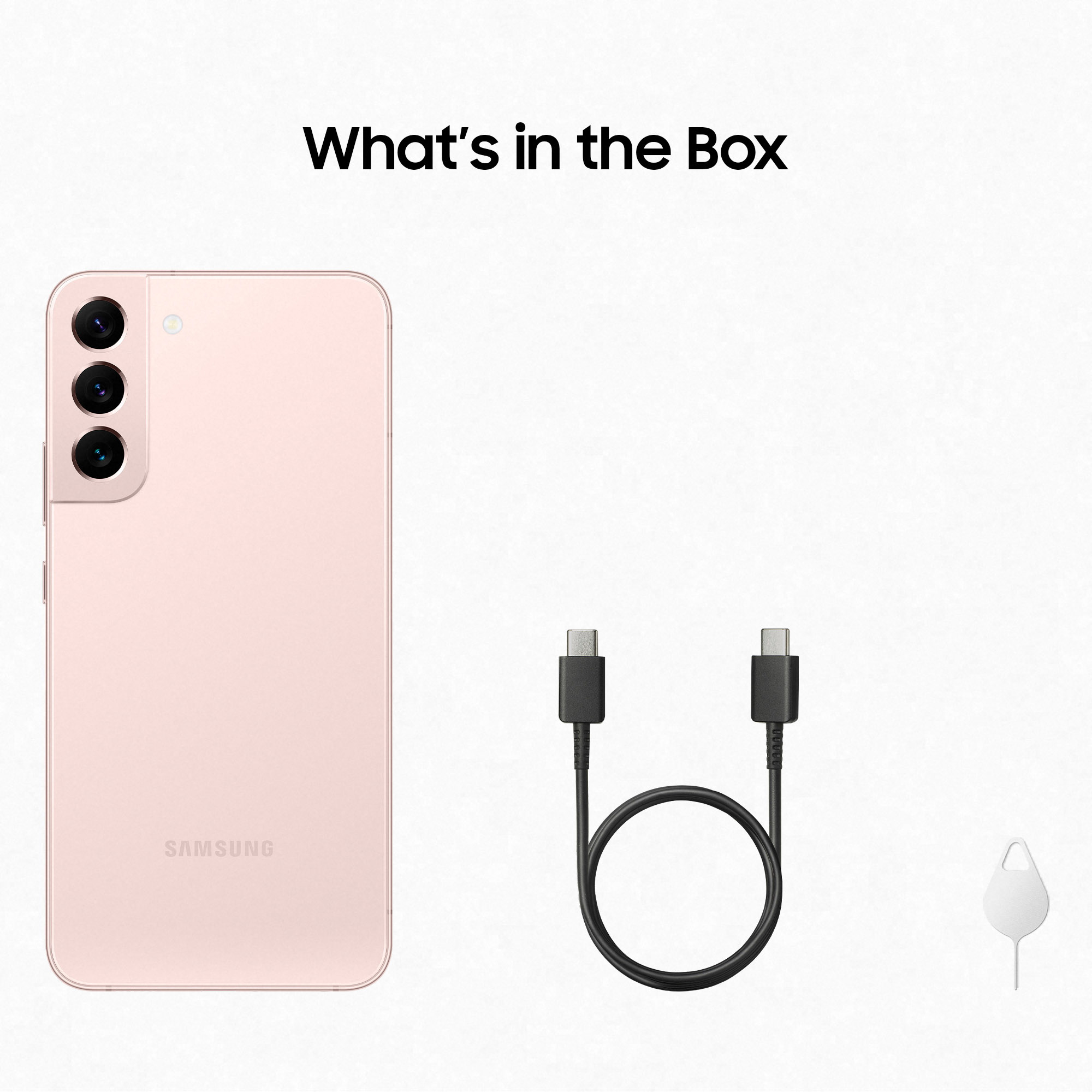 Różowy smartfon, kabel USB i narzędzie do wysuwania karty SIM na białym tle.