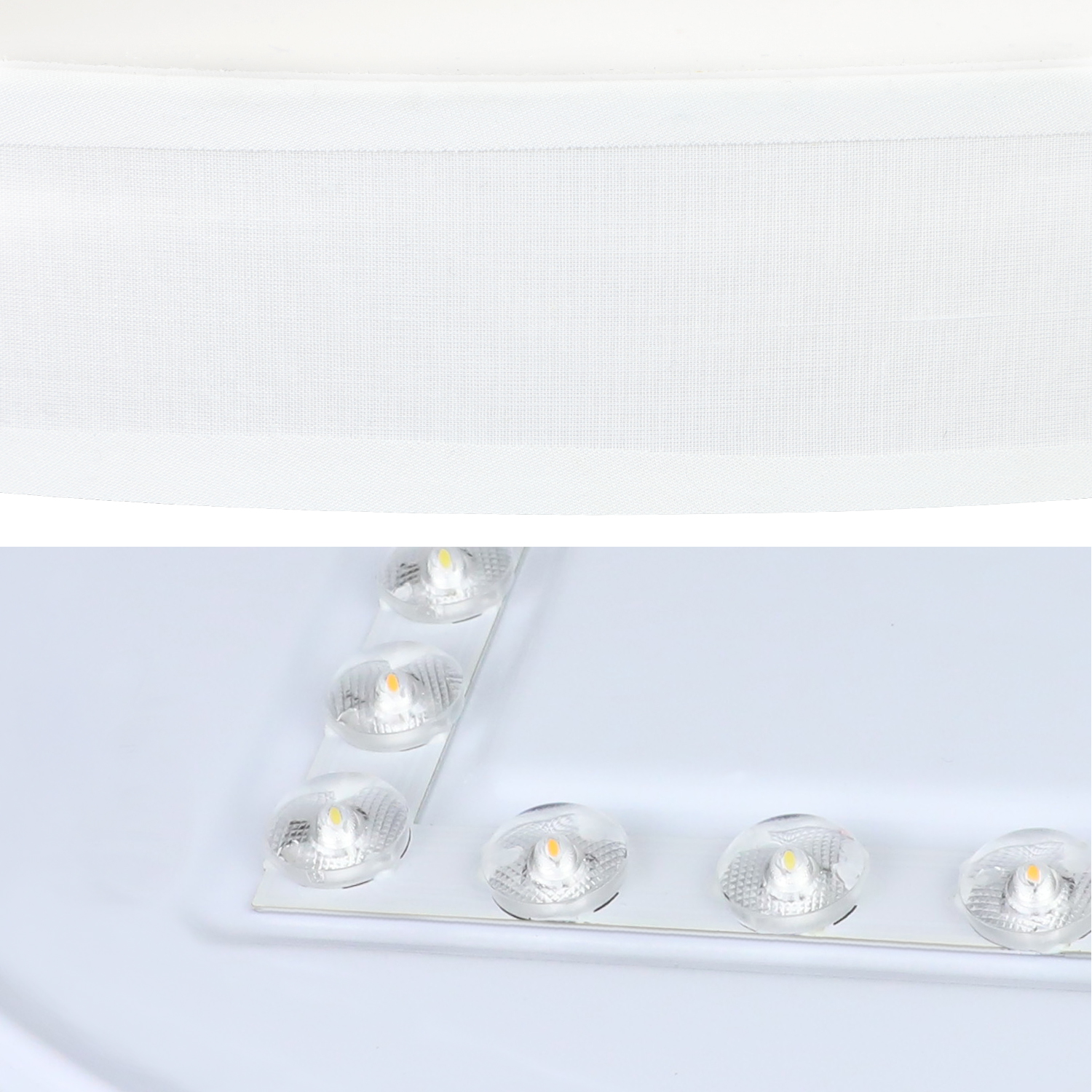 Zbliżenie na paski świetlne LED. Paski znajdują się na białej powierzchni, z widocznymi żarówkami LED.