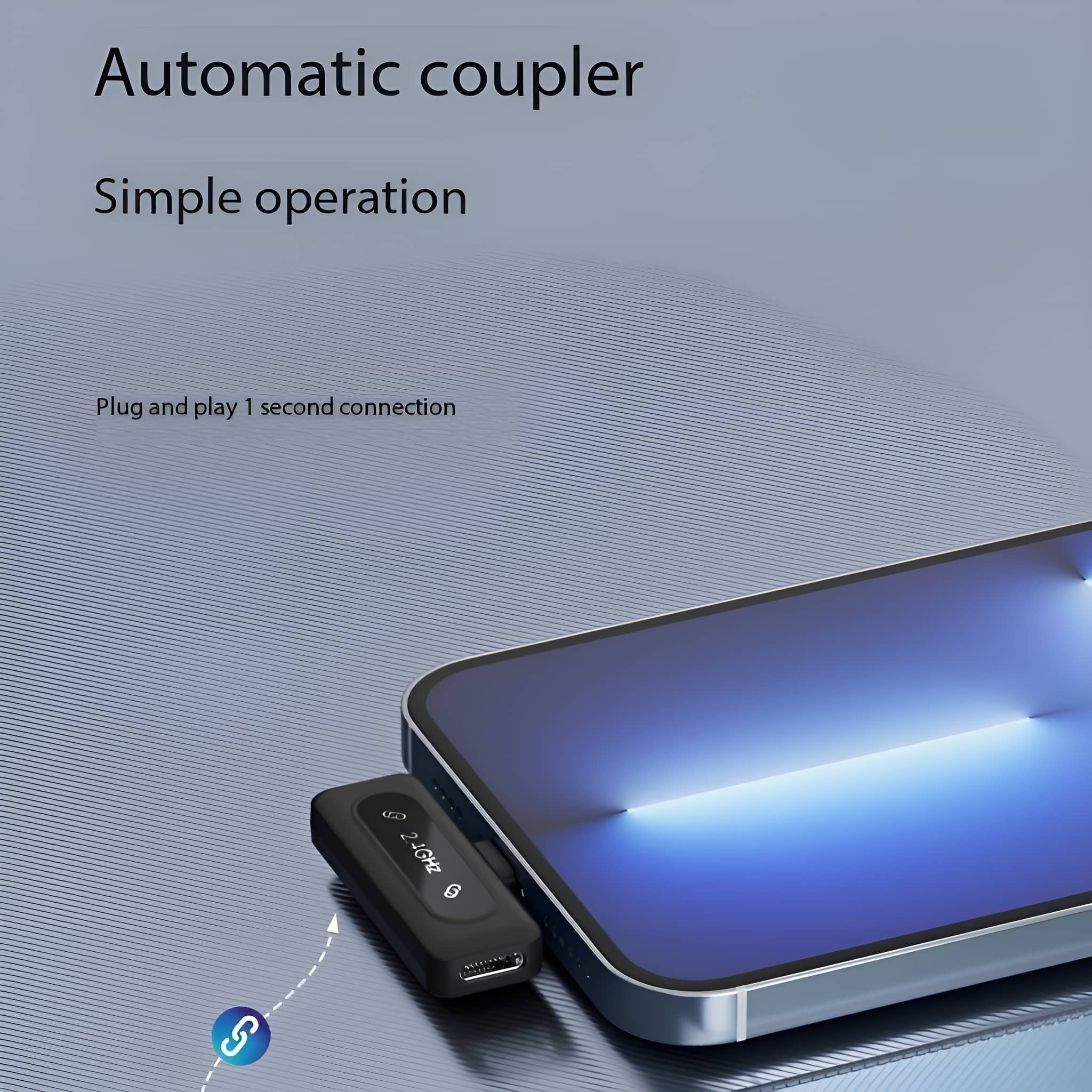 Schwarzer Adapter, verbunden mit einem Telefon, Text: Automatischer Koppler.