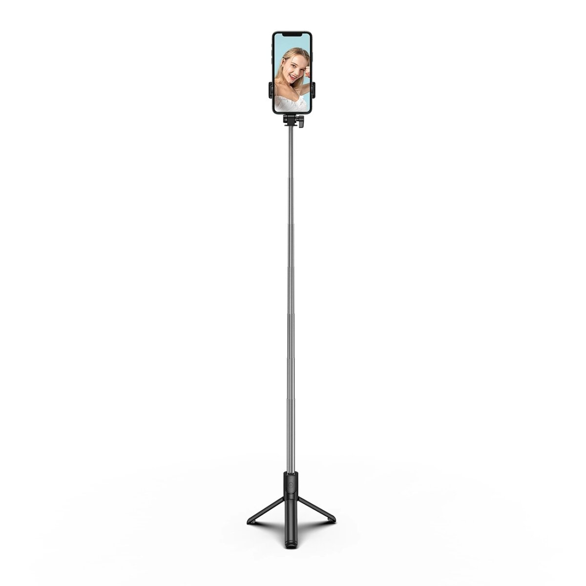 Ein Selfie-Stick mit einem daran befestigten Telefon, das das Gesicht einer Frau zeigt. Er ist ausgezogen.