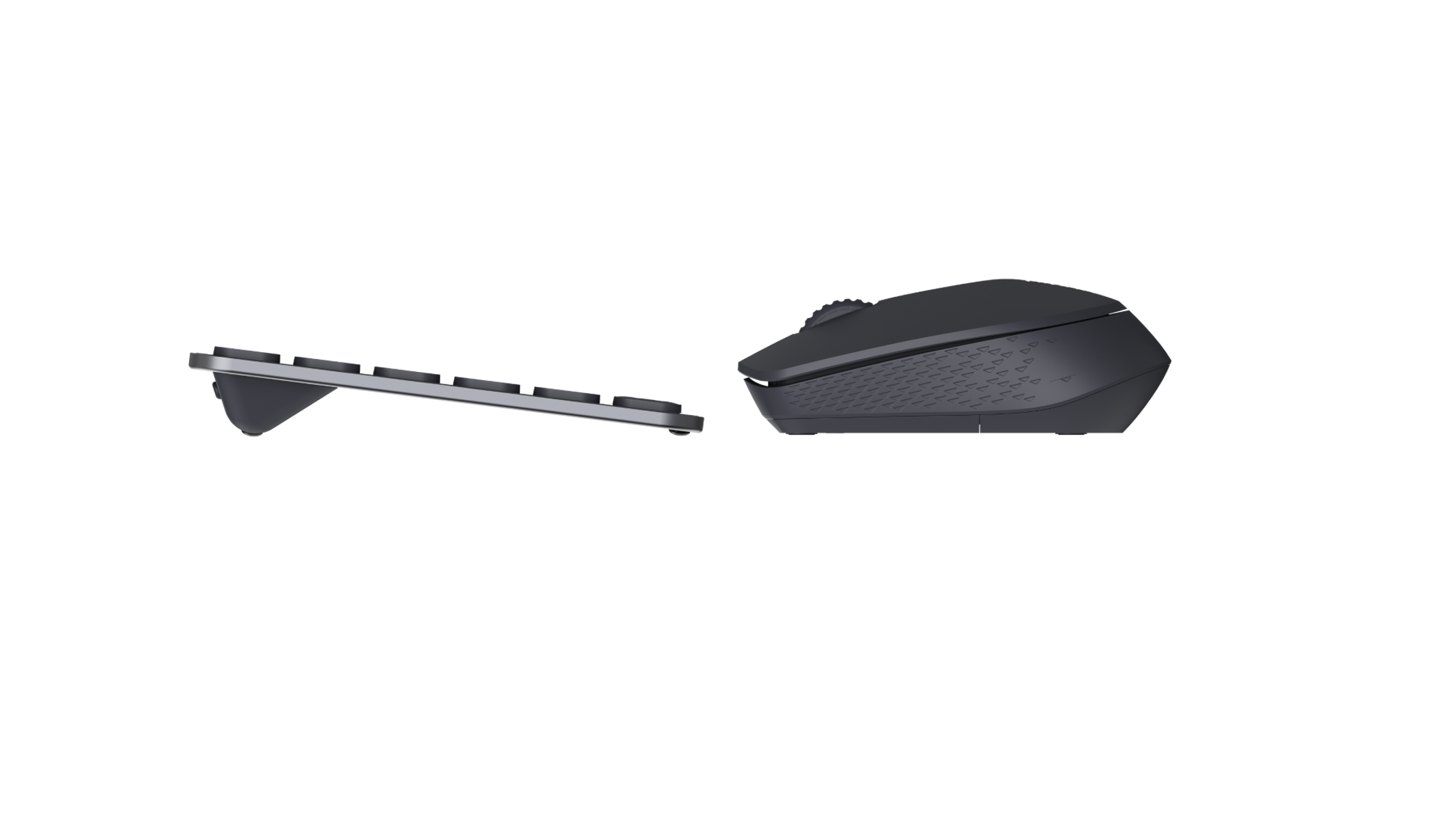 Una tastiera nera e un mouse su sfondo nero.