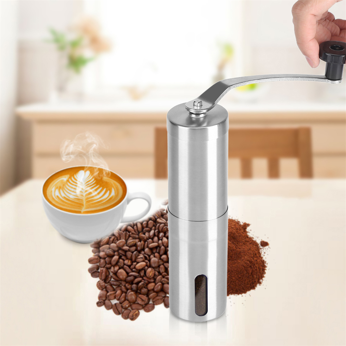 Silberne manuelle Kaffeemühle, Kaffeebohnen, gemahlener Kaffee und Kaffee-Art.