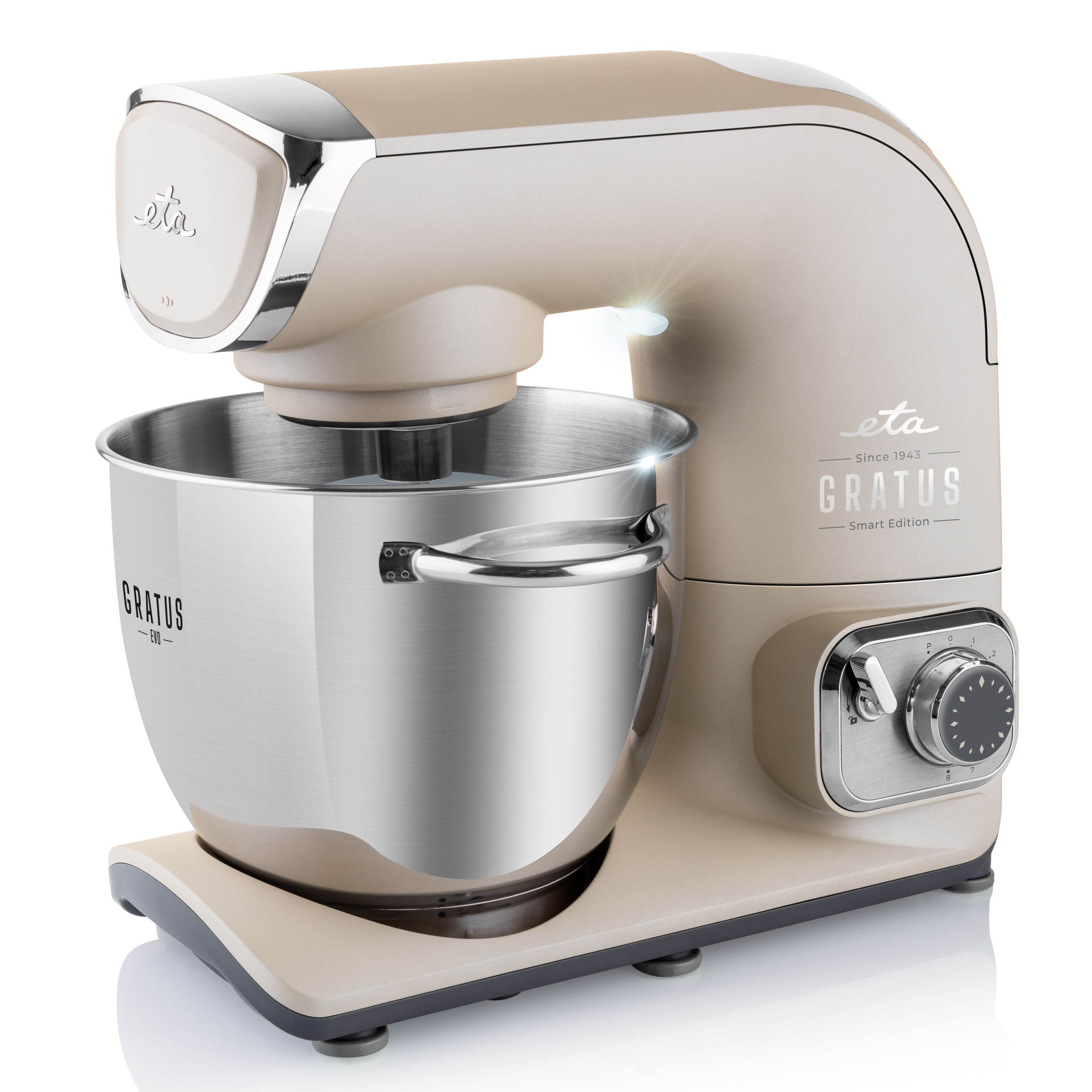 Impastatrice beige e argento con una ciotola in acciaio inox.