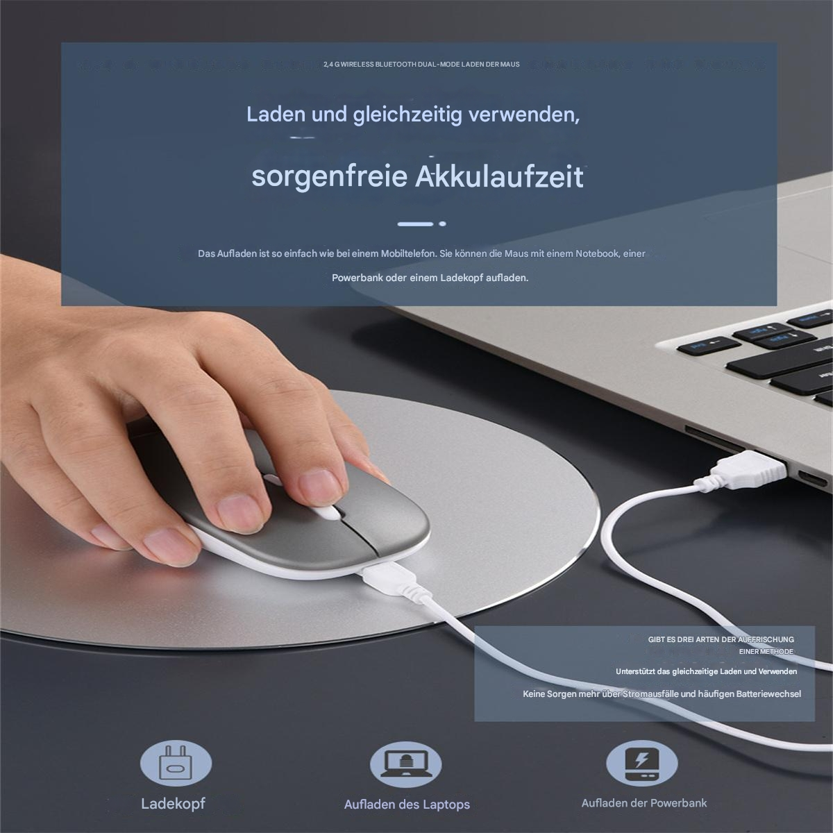 Hand benutzt Maus, verbunden mit Laptop. Text auf dem Bildschirm, Ladegerät und Powerbank.