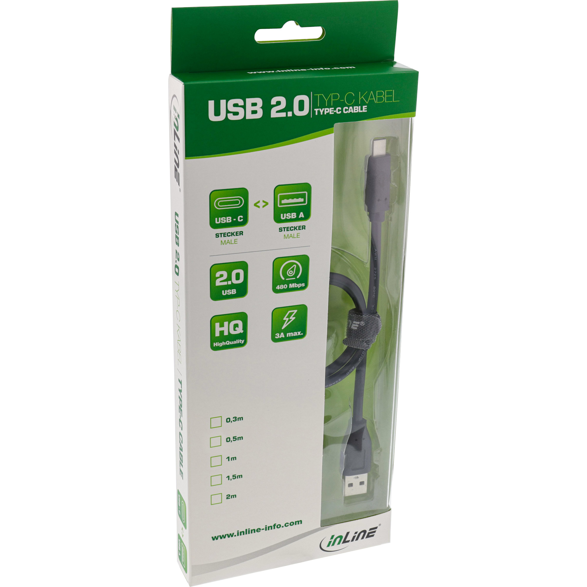 Câble USB dans une boîte. La boîte est blanche et verte. Le câble est noir.