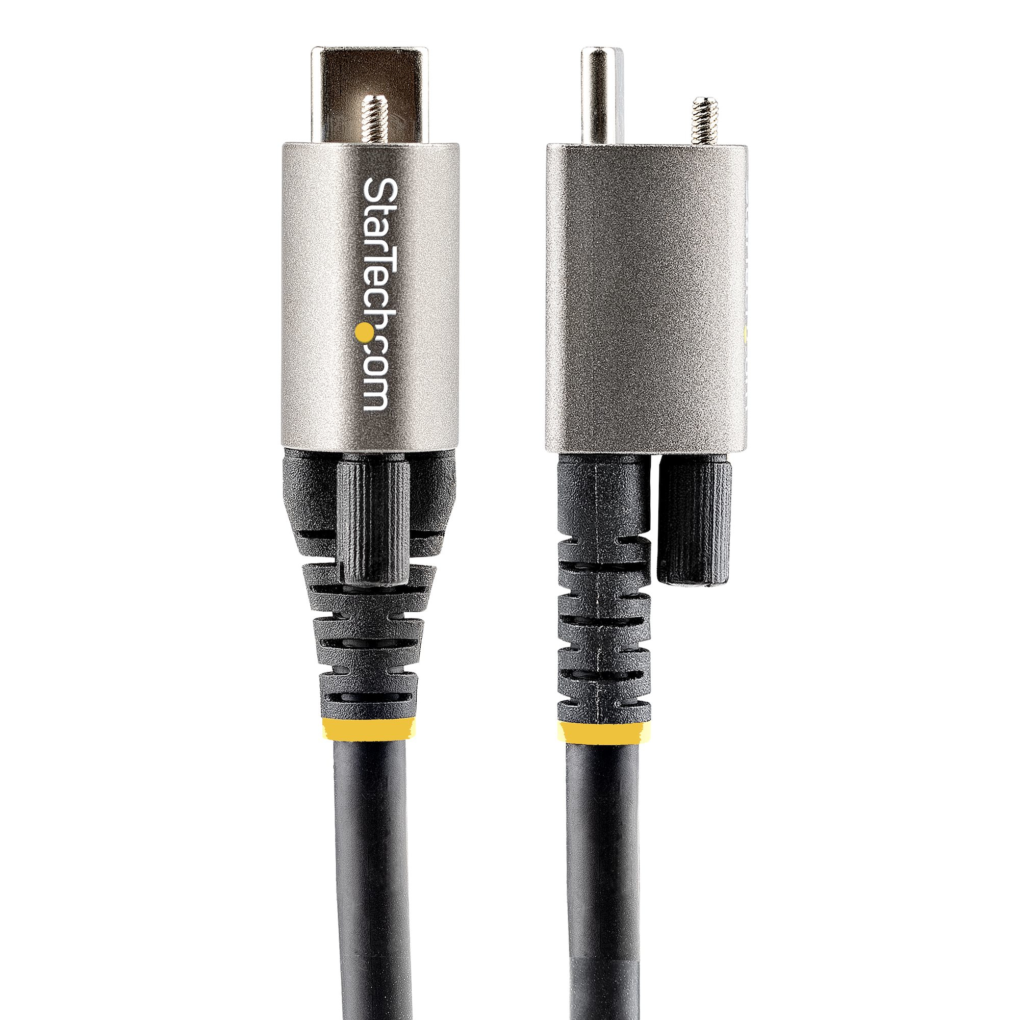 Primer plano de un conector de cable plateado y negro sobre fondo blanco.