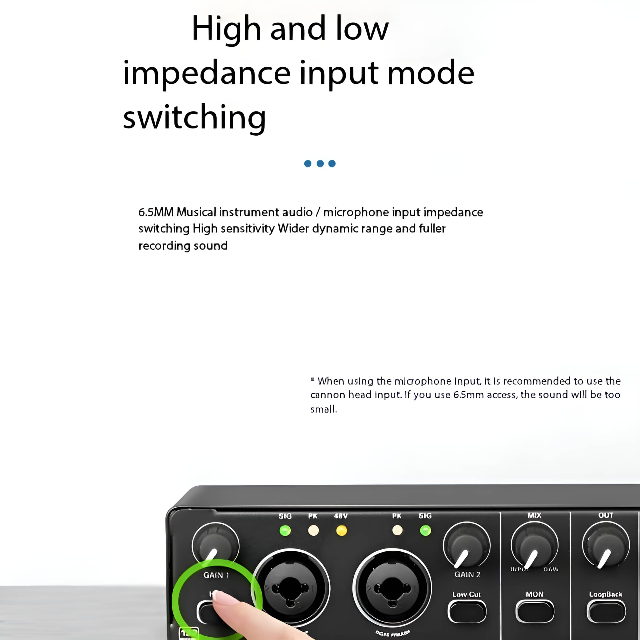 Ein schwarzes Audio-Interface mit Knöpfen und Tasten. Ein Finger berührt einen grün markierten Knopf.
