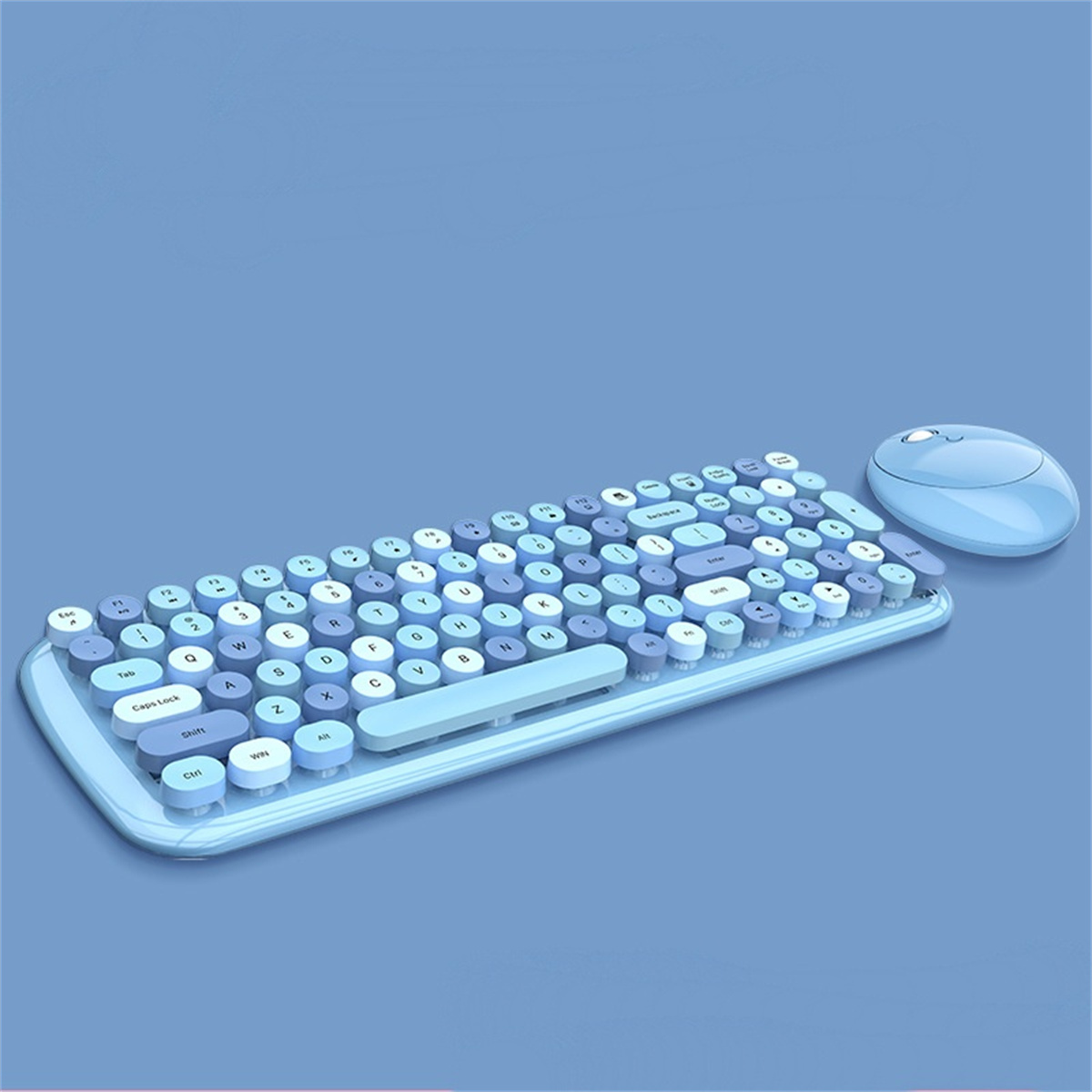 Eine blaue Tastatur und Maus auf einer blauen Oberfläche. Die Tasten sind rund.