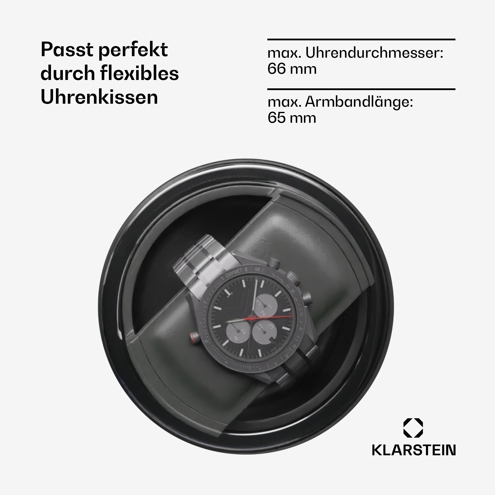 Eine schwarze Uhr auf einem schwarzen Uhrenbeweger. Text: Passt perfekt durch flexibles Uhrenkissen.