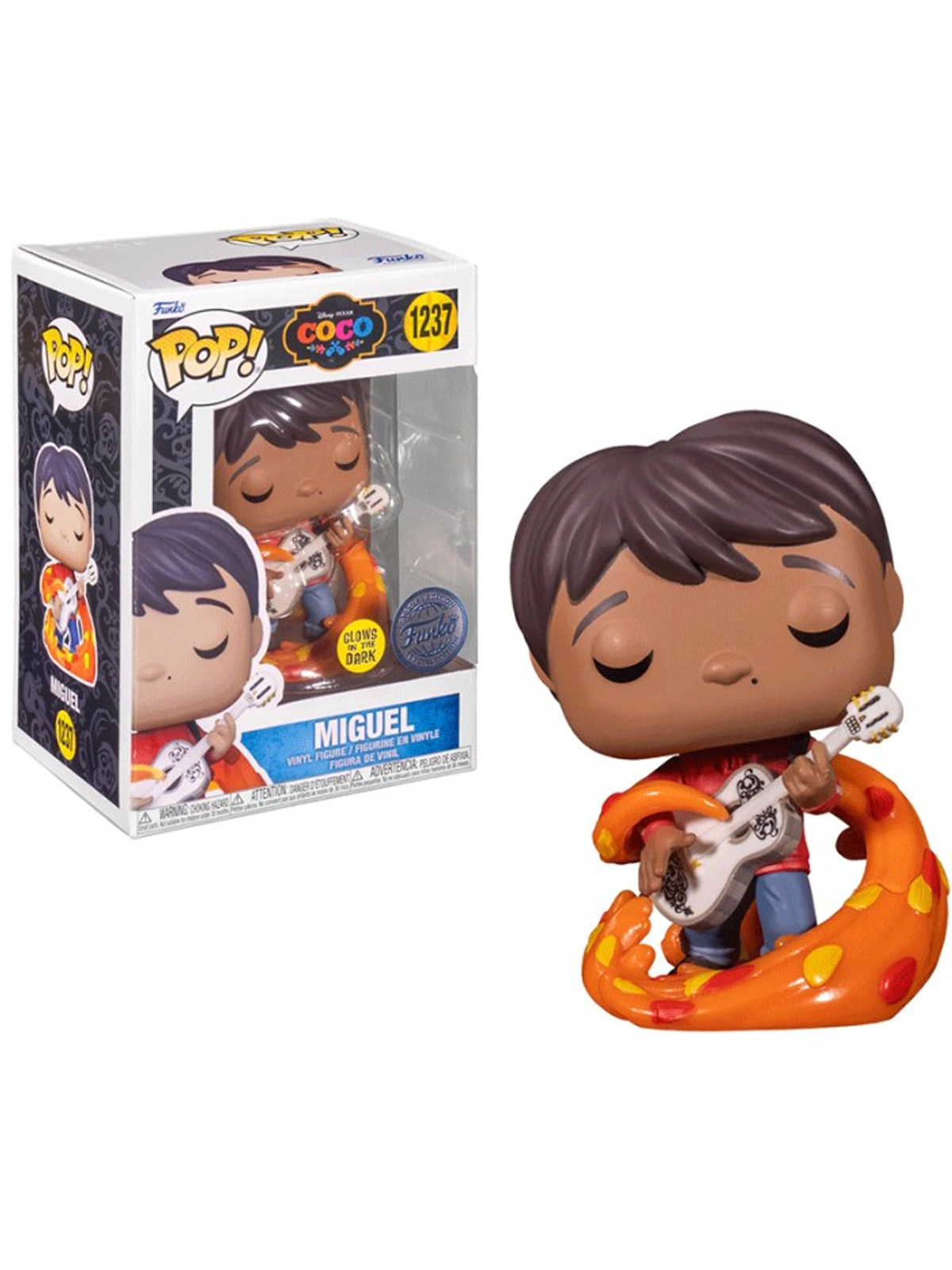 Una figura Funko Pop! de Miguel de Coco, sosteniendo una guitarra, con una caja a la izquierda.
