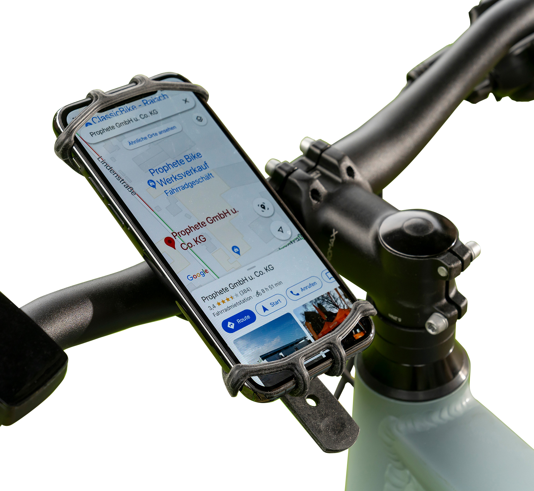 Ein Telefon, das an einem Fahrradlenker befestigt ist und eine Karte und Navigationsanweisungen anzeigt.