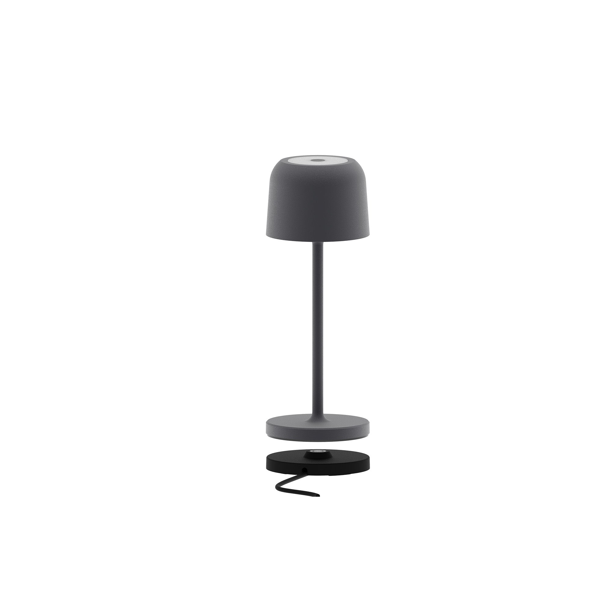 Eine graue Tischlampe mit rundem Fuß. Der Lampenschirm ist ebenfalls rund. Schwarzes Kabel unten.