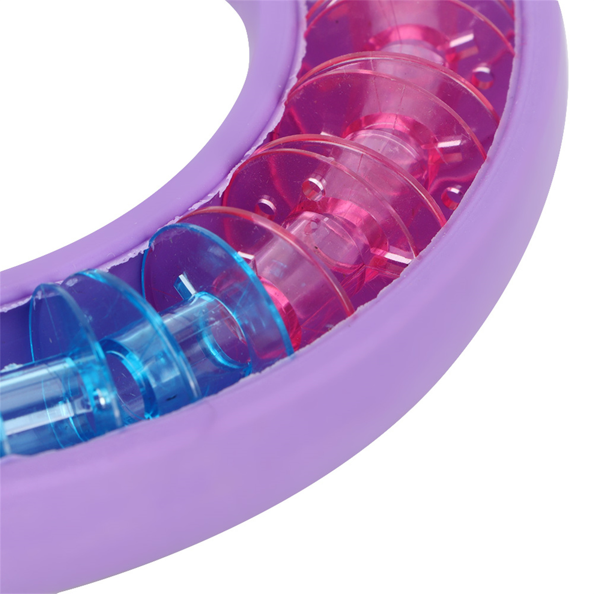 Lila rollenförmiges Massagegerät mit blauen und rosa Rollen.