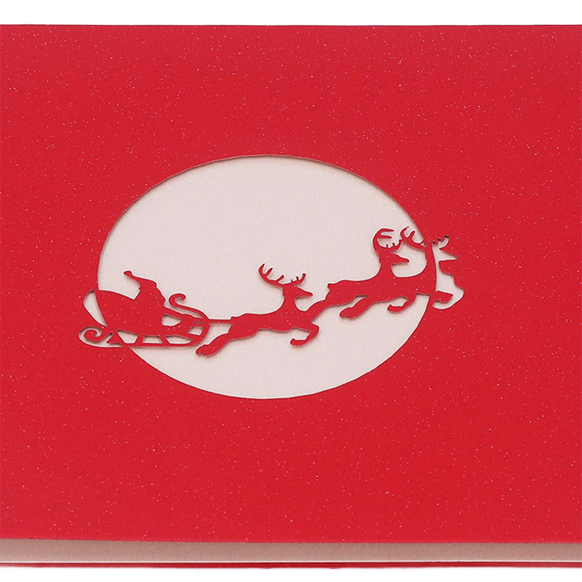 Eine rote Weihnachtskarte mit einem weißen Kreisausschnitt, der den Weihnachtsmann und Rentiere zeigt, vor weißem Hintergrund.
