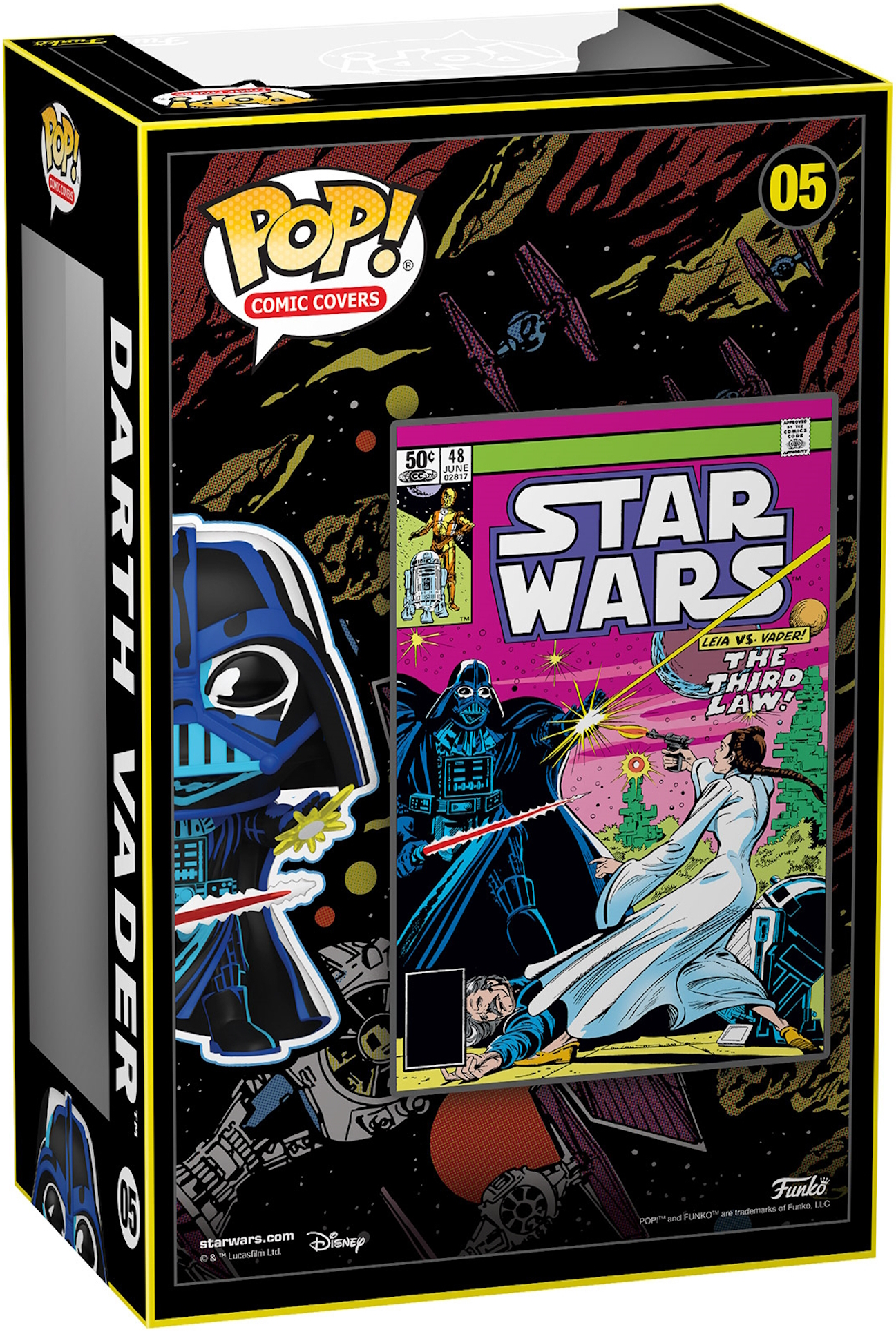 Una caja con una figura de Darth Vader. También es visible la portada del cómic de Star Wars.