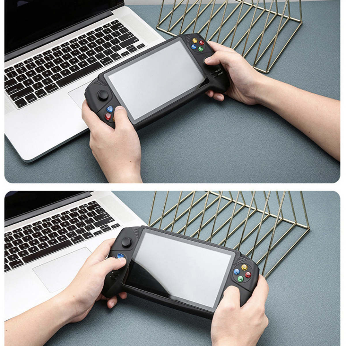 Hände halten eine schwarze Handheld-Spielkonsole mit einem Laptop und einem goldenen Metallgestell im Hintergrund.