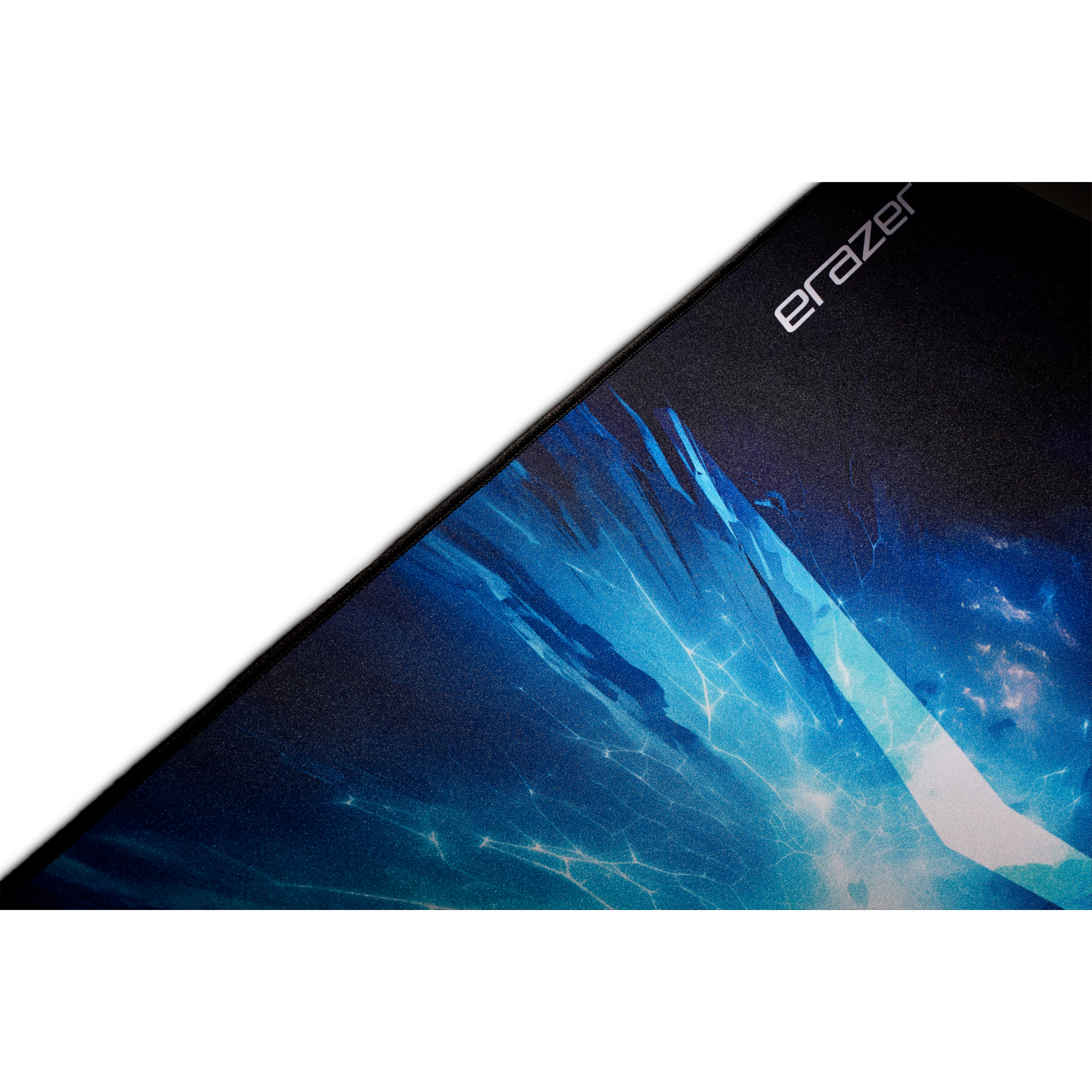 Close-up of a black mousepad with a blue and white design. The word 'eRazer' is visible.