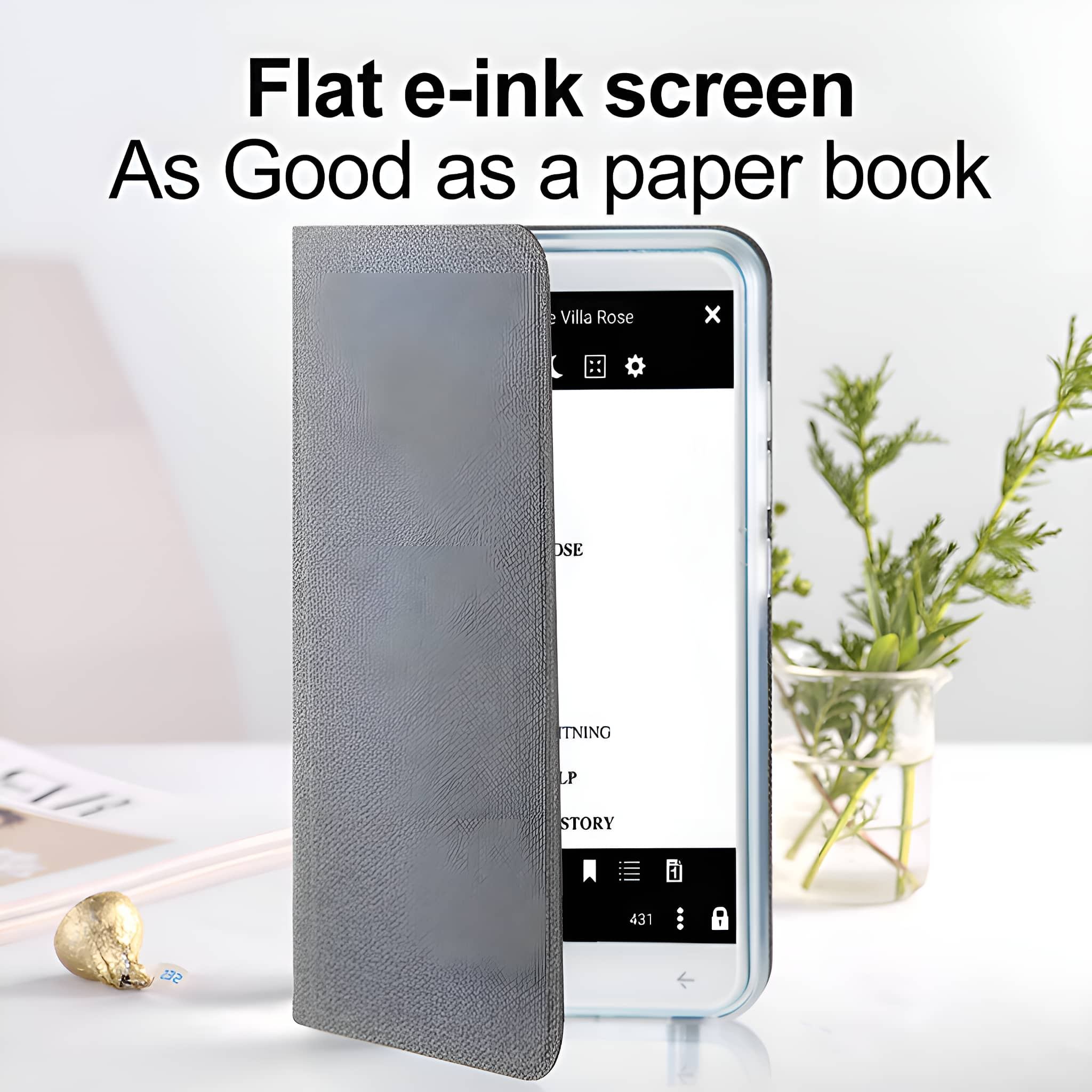 E-Ink-Bildschirm, offene Buchetui, weißer Hintergrund. Text auf dem Bildschirm. Grüne Pflanzen.