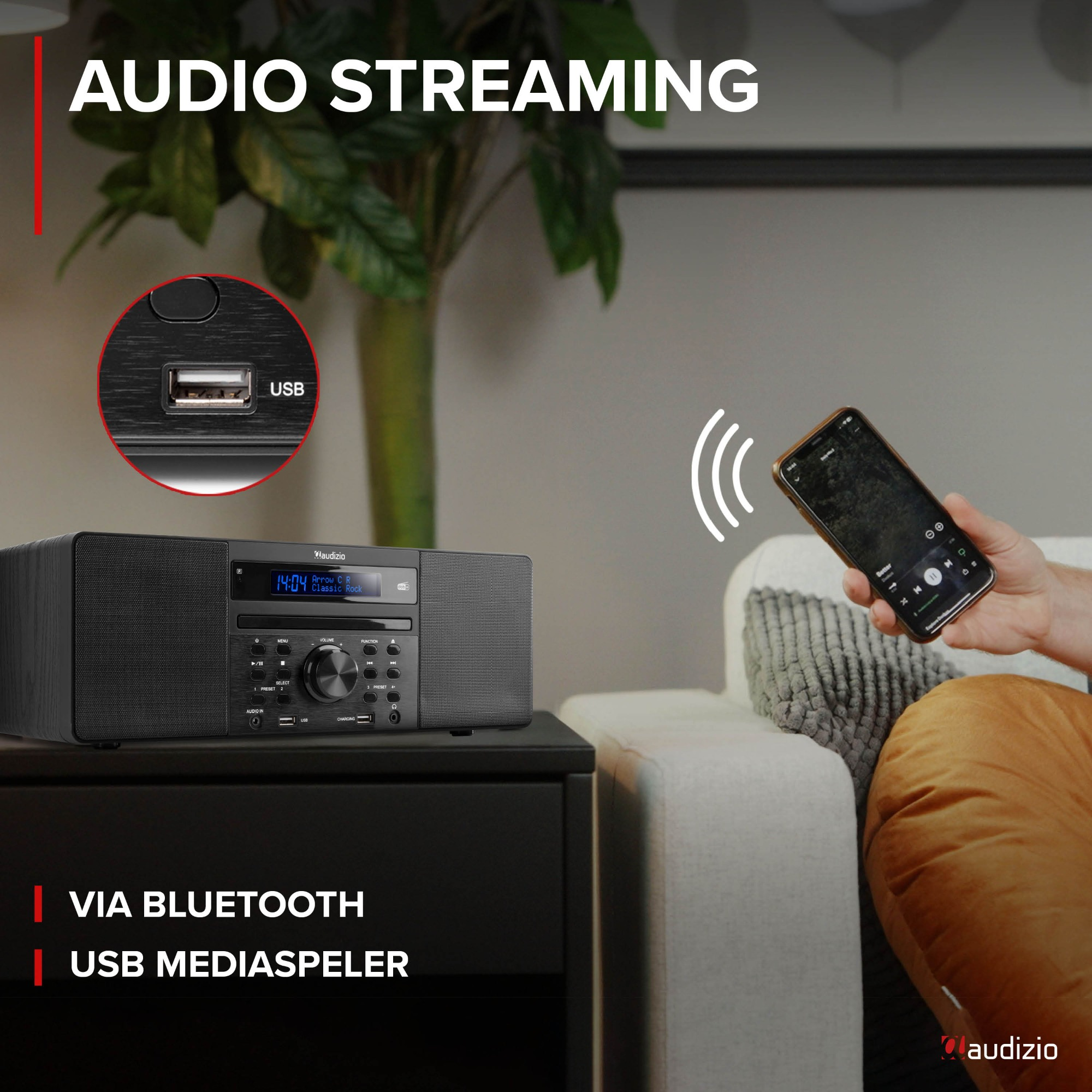 Schwarzes Stereoanlage auf einem Nachttisch, Telefon streamt Musik. Text: Audio-Streaming über Bluetooth, USB.