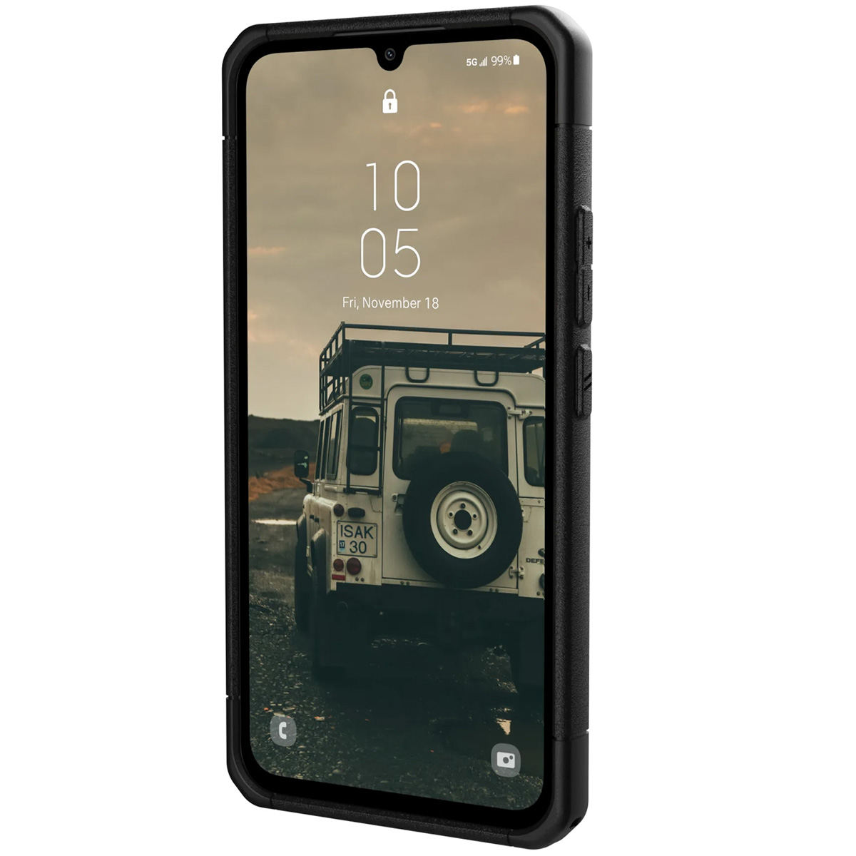 Black phone with a screen showing the date and a white off-road vehicle on a dirt road.