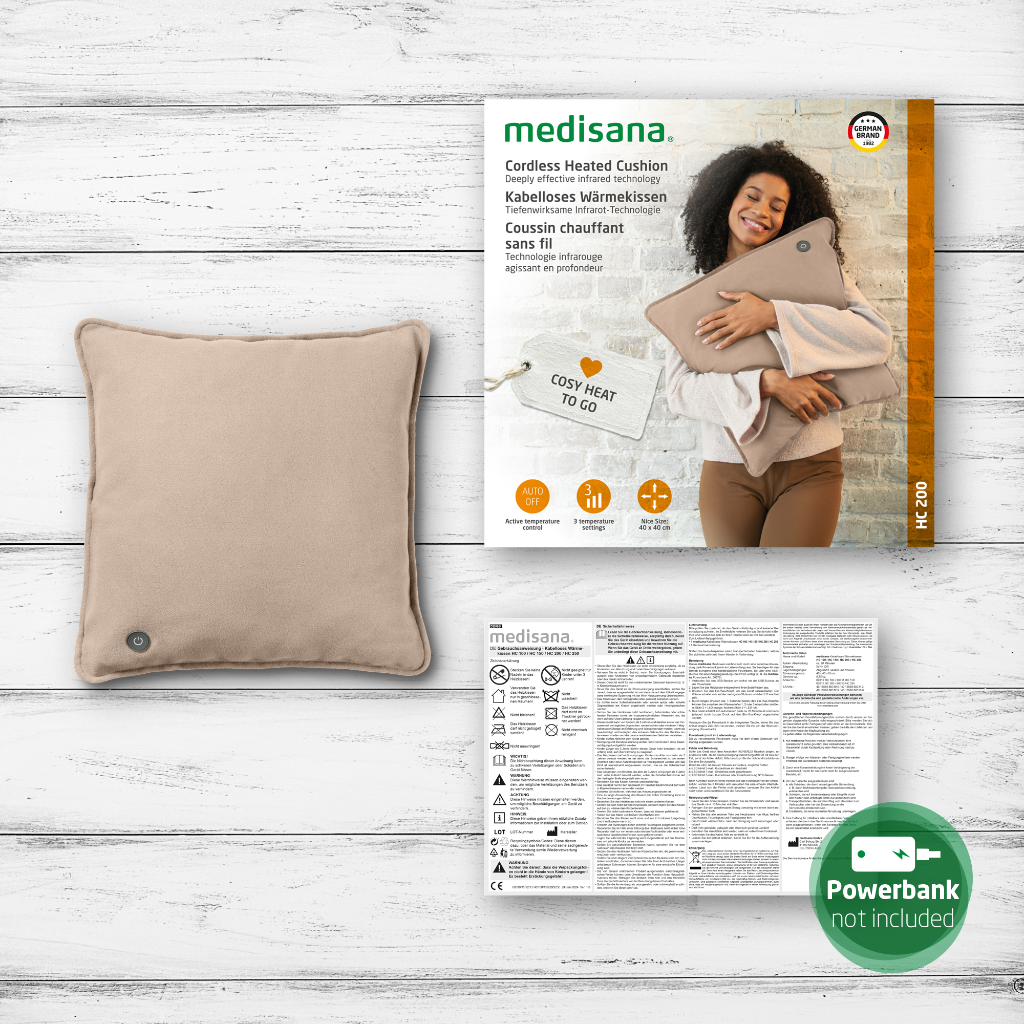 Heizkissen mit Frau, die es hält, Produktverpackung und Handbuch.