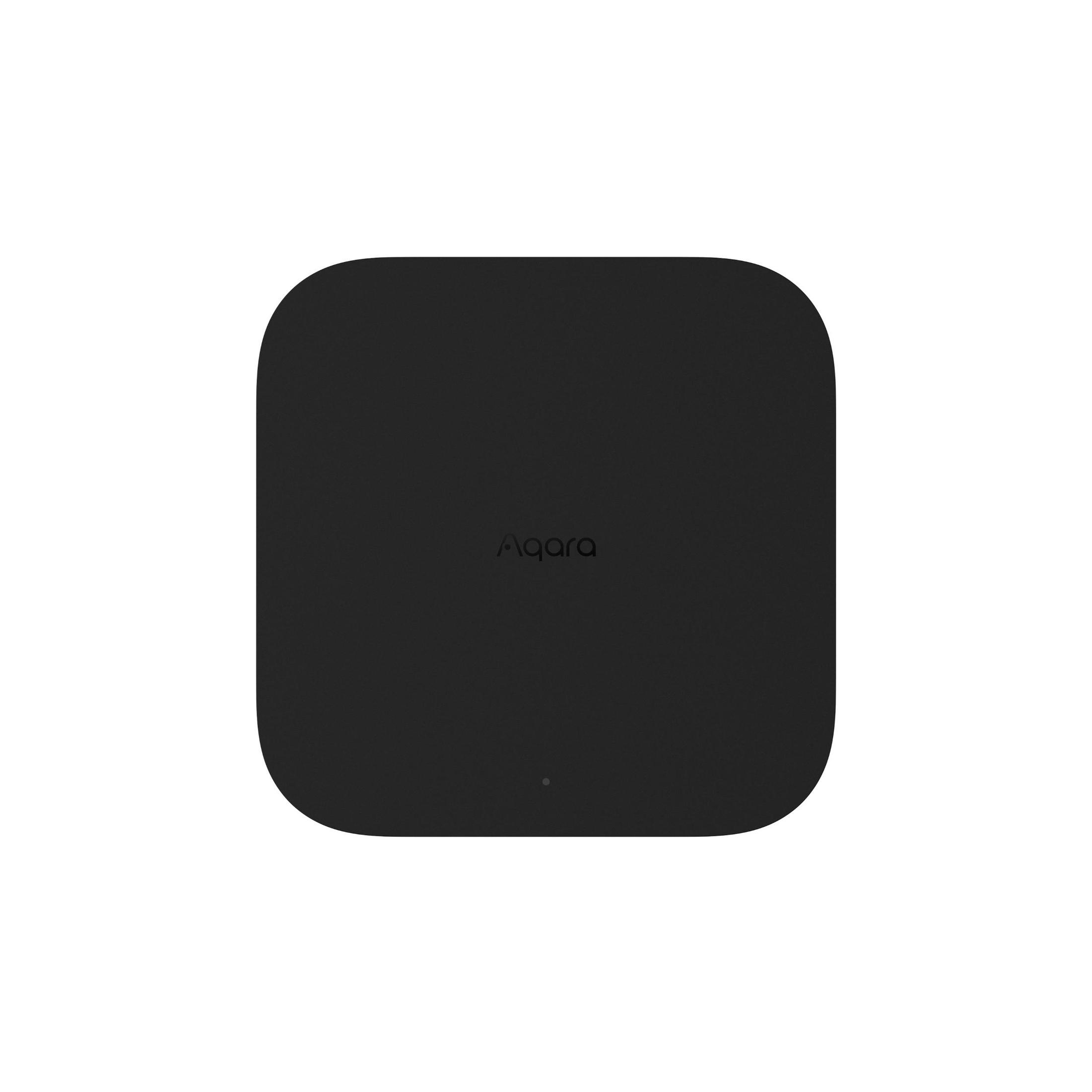 Schwarzer quadratischer Aqara-Hub mit weißem Logo auf weißem Hintergrund.