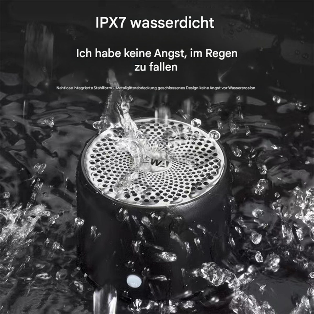 Ein schwarzer Lautsprecher, auf den Wasser spritzt. Text auf Deutsch oben.