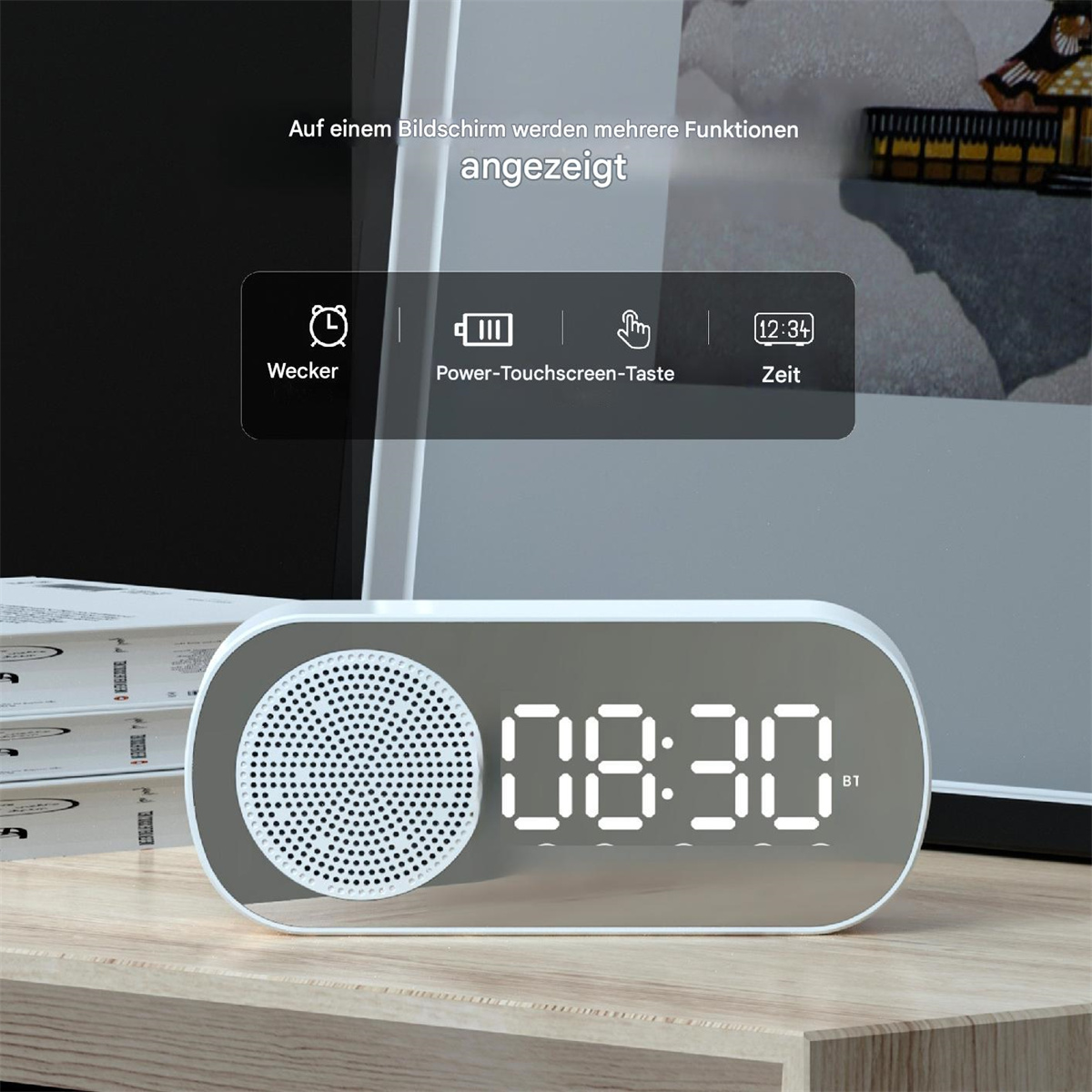 Eine Digitaluhr mit Lautsprecher, die 08:30 anzeigt. Sie hat Zeit-, Alarm- und Touch-Tasten.