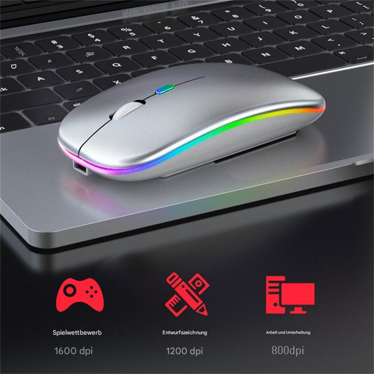 Eine silberne kabellose Maus mit einem regenbogenfarbenen Lichtstreifen auf einem Laptop.