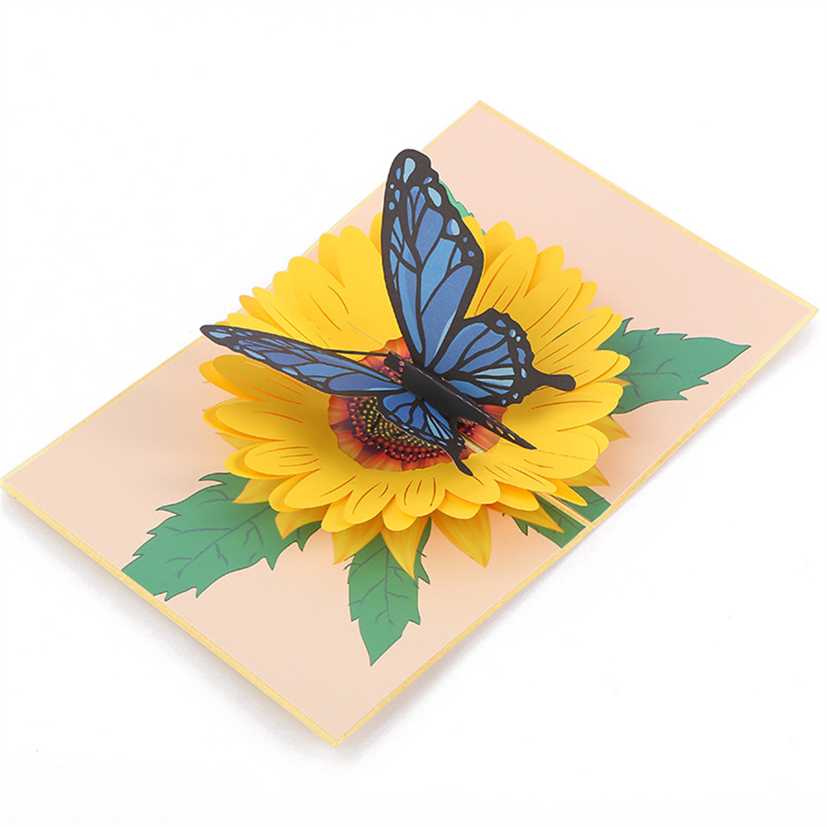 Pop-up-Karte: gelbe Sonnenblume mit blauem Schmetterling, vor pfirsichfarbenem Hintergrund.