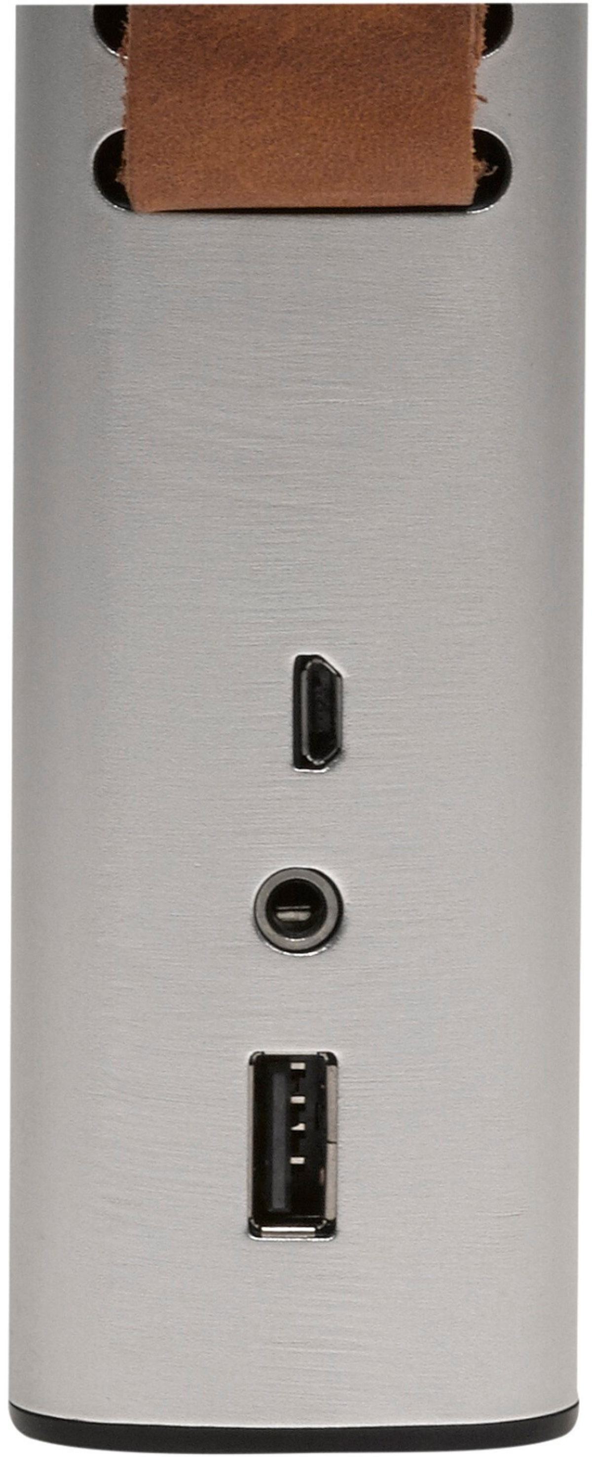 Srebrny cylindryczny przedmiot z portami i brązowym paskiem.