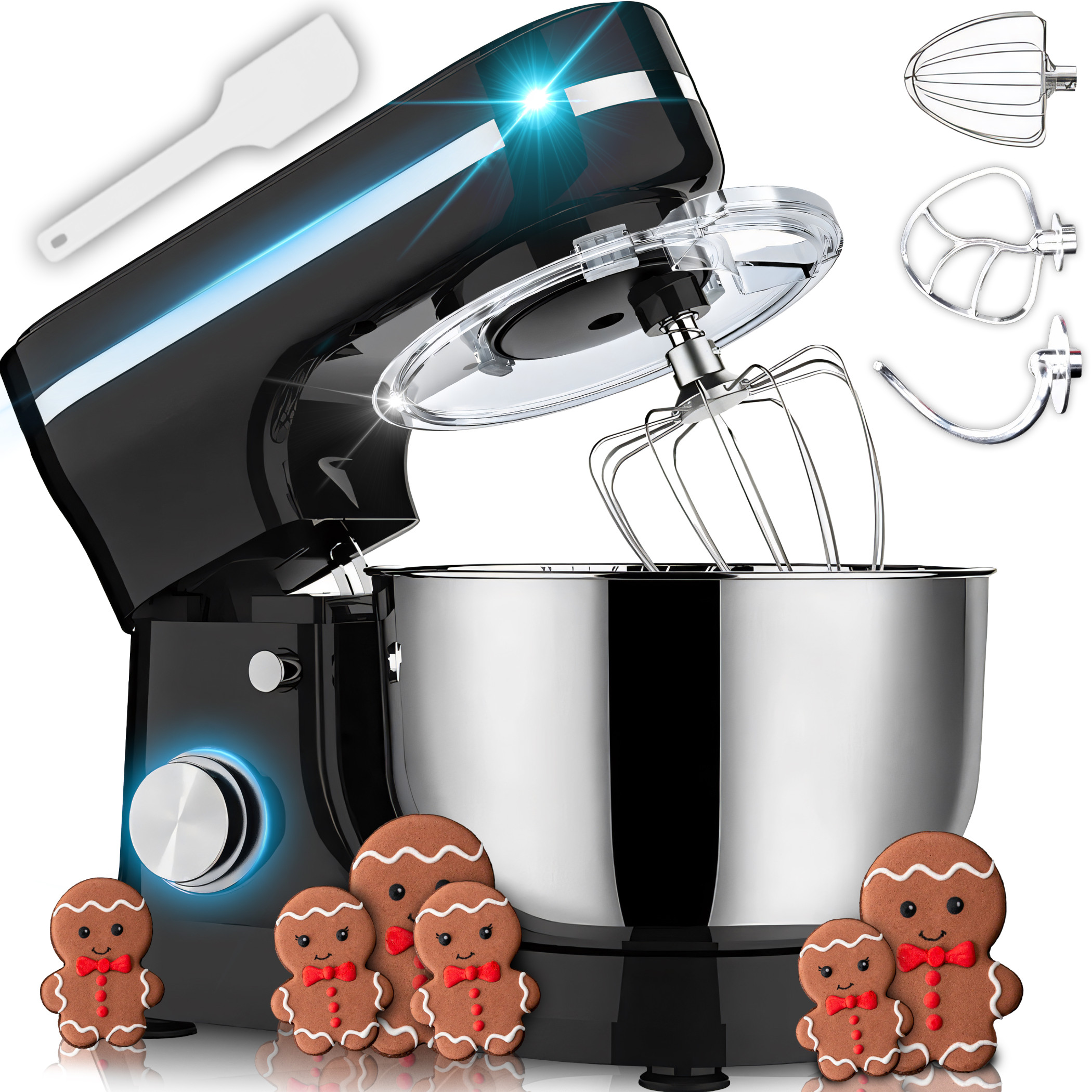 Ein schwarzer Küchenmixer mit Aufsätzen, einem Spatel und Lebkuchenmännern in einer Küchenumgebung.