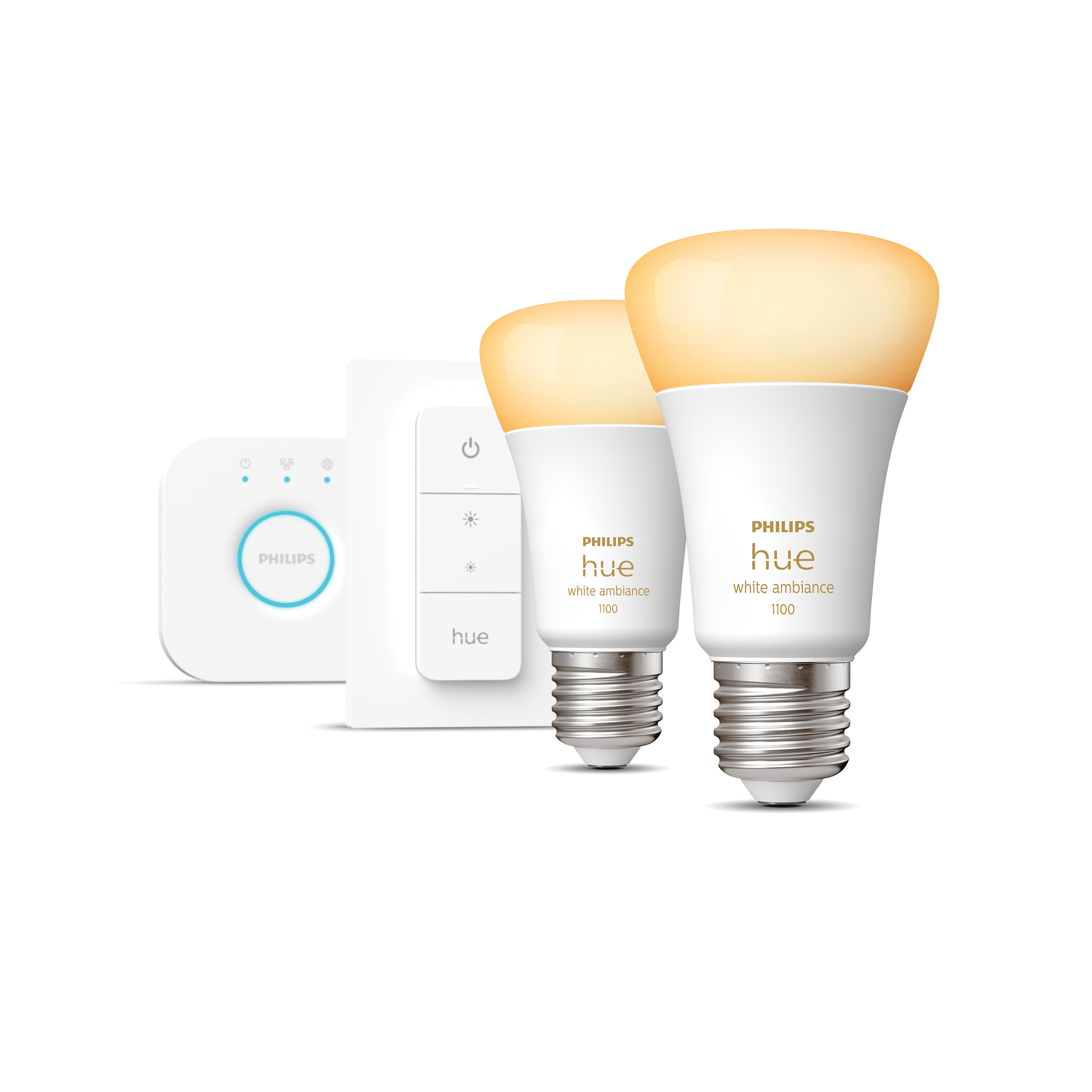 Deux ampoules intelligentes Philips Hue, un hub et un interrupteur sur fond blanc.