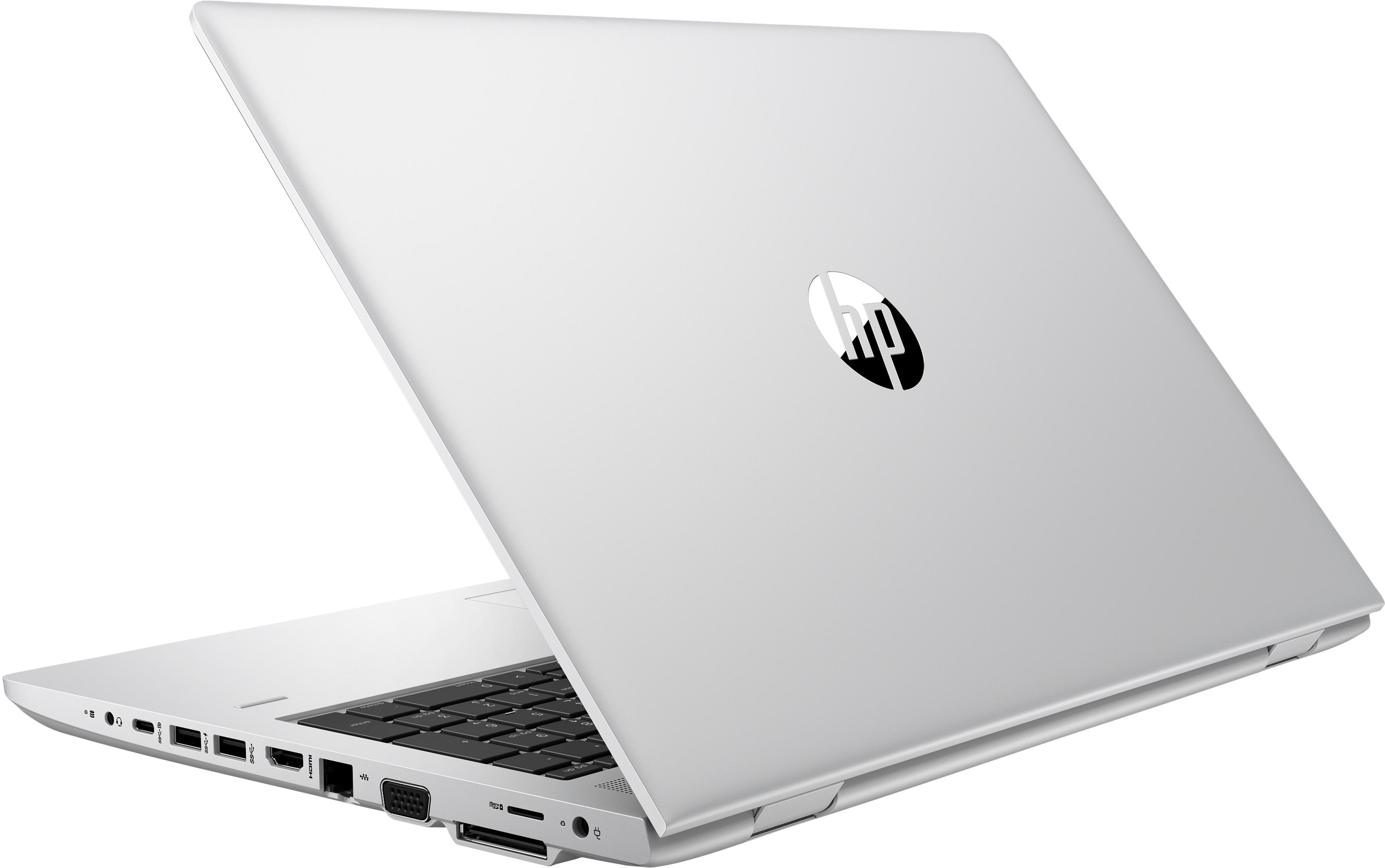 Una computadora portátil plateada, en ángulo hacia la derecha, con el logotipo de HP visible en la parte superior. La pantalla está cerrada.