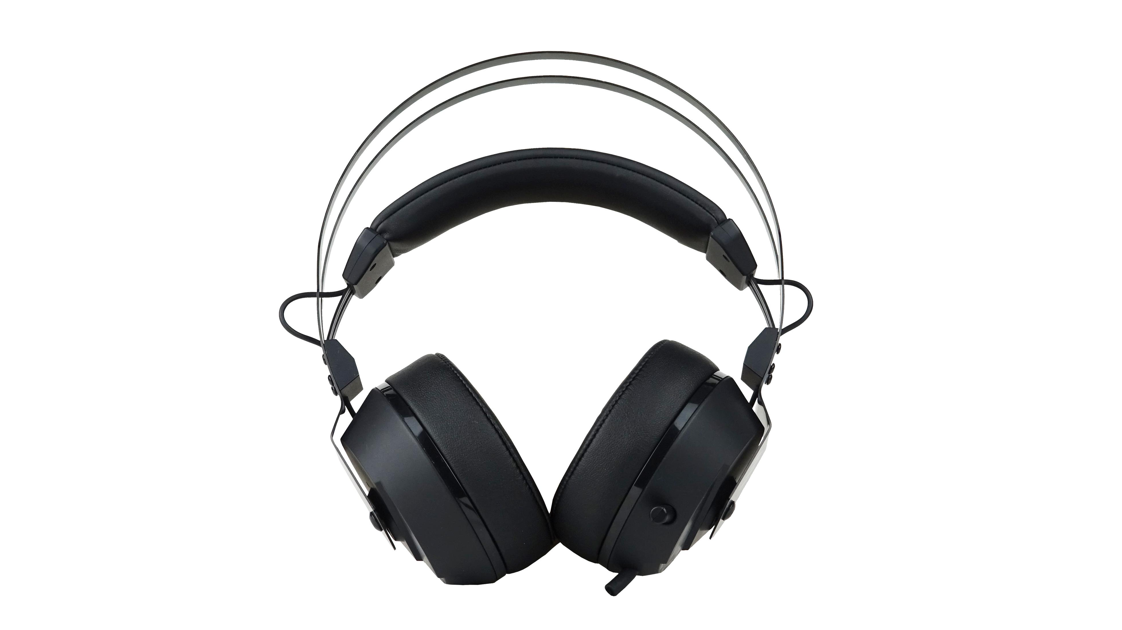 Czarne słuchawki leżące na białej powierzchni. Słuchawki mają metalowy pałąk i czarne nauszniki.
