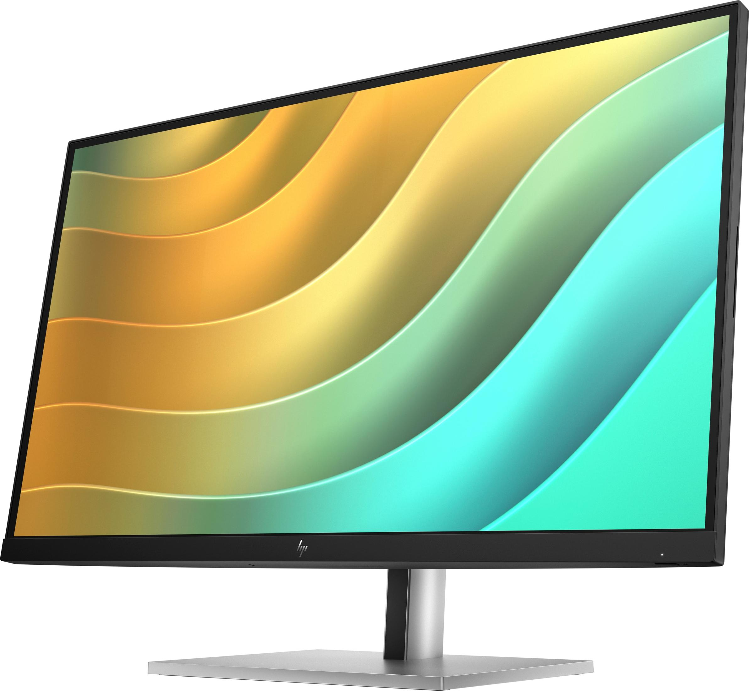 Monitor de computadora HP con pantalla curva que muestra un patrón colorido abstracto, base plateada.